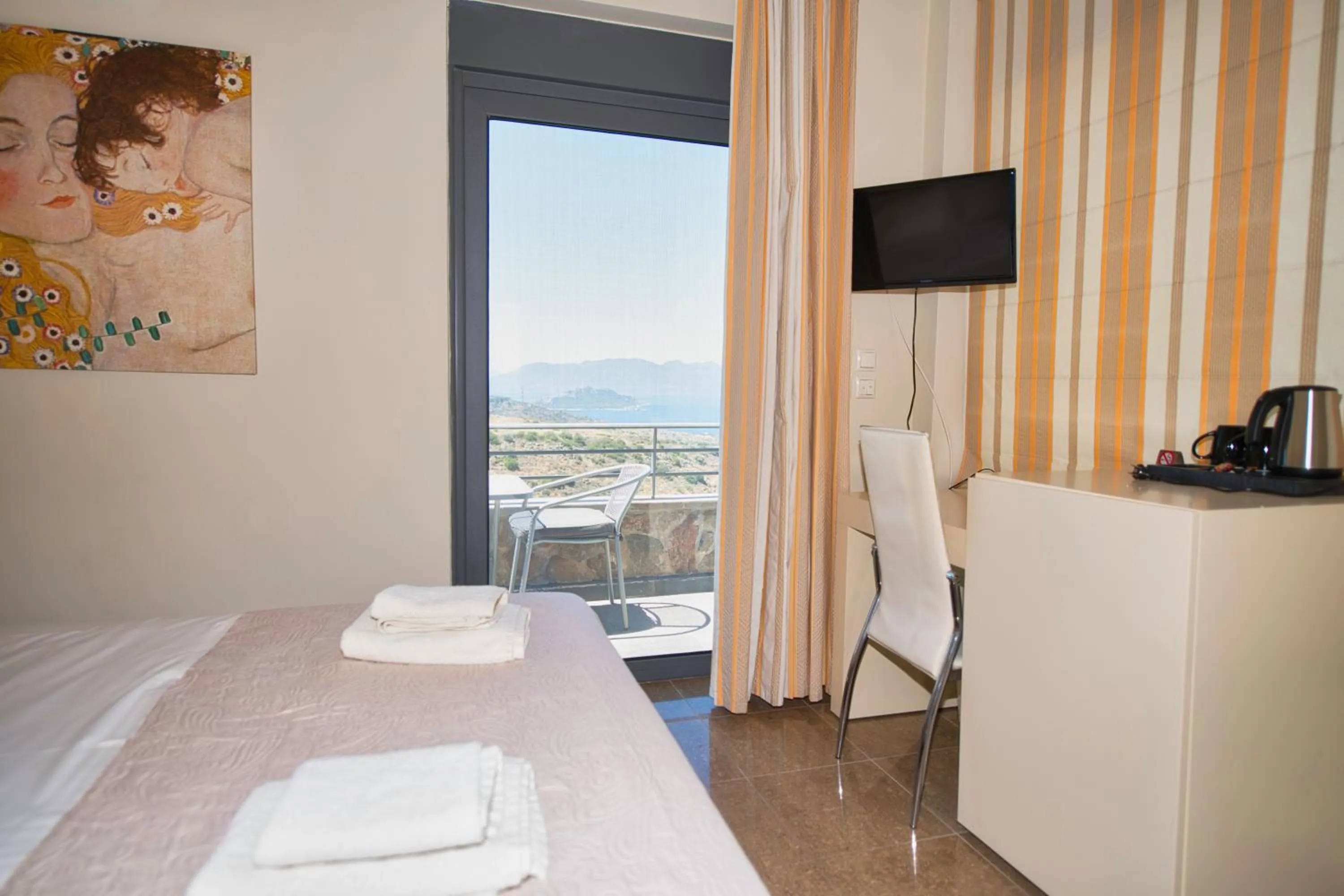 TV and multimedia in Marini Luxury Apartments and Suites