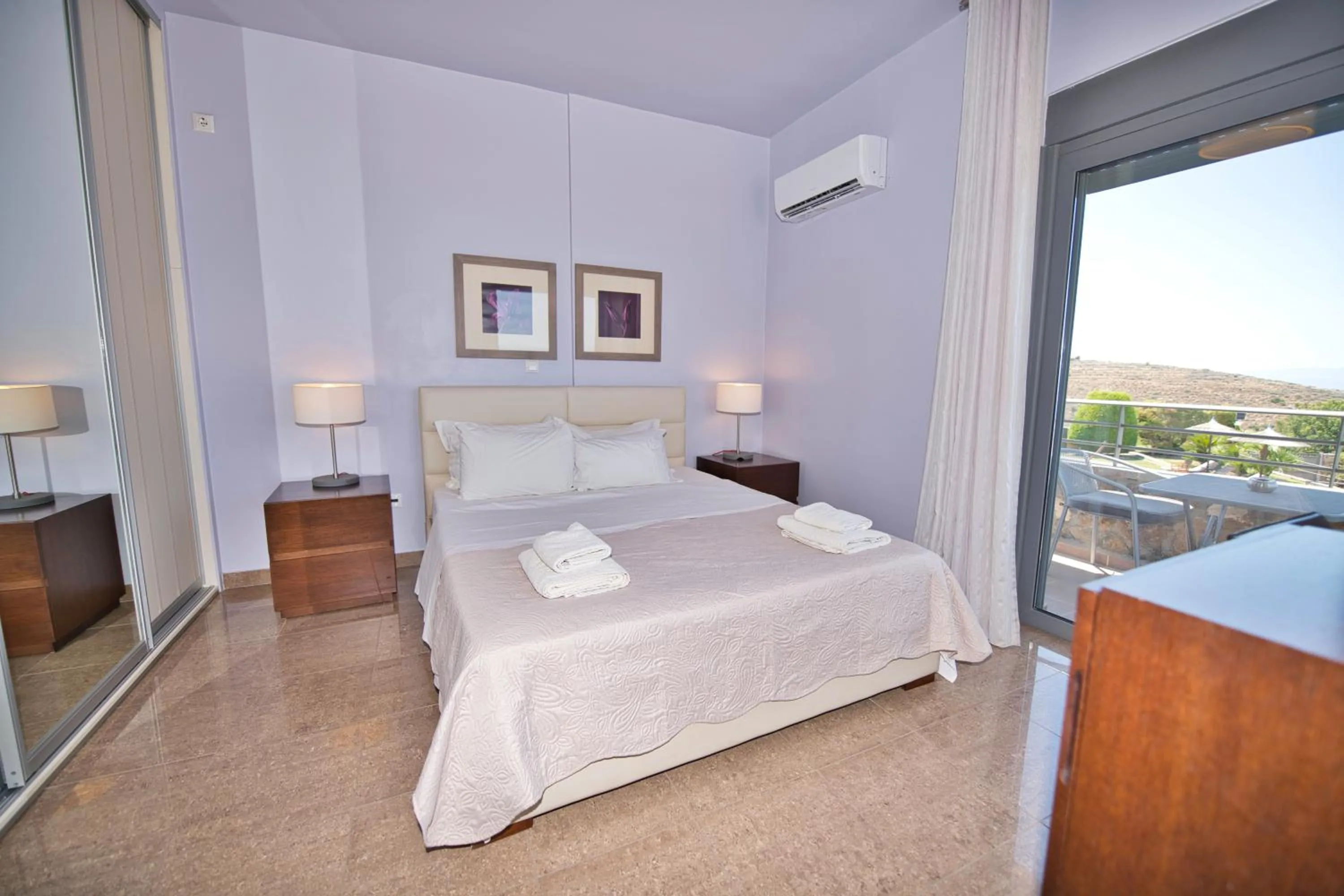 Bed in Marini Luxury Apartments and Suites