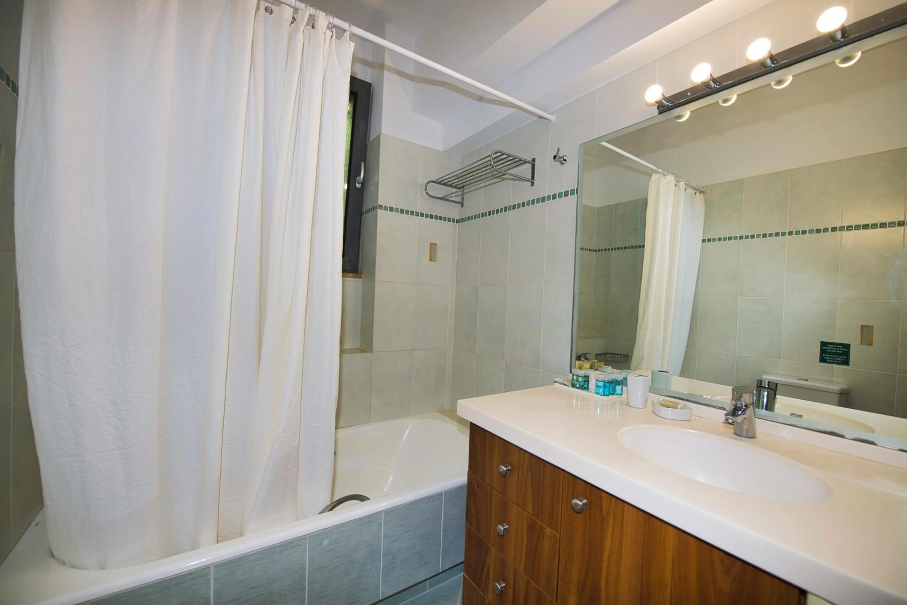 Bathroom in Marini Luxury Apartments and Suites
