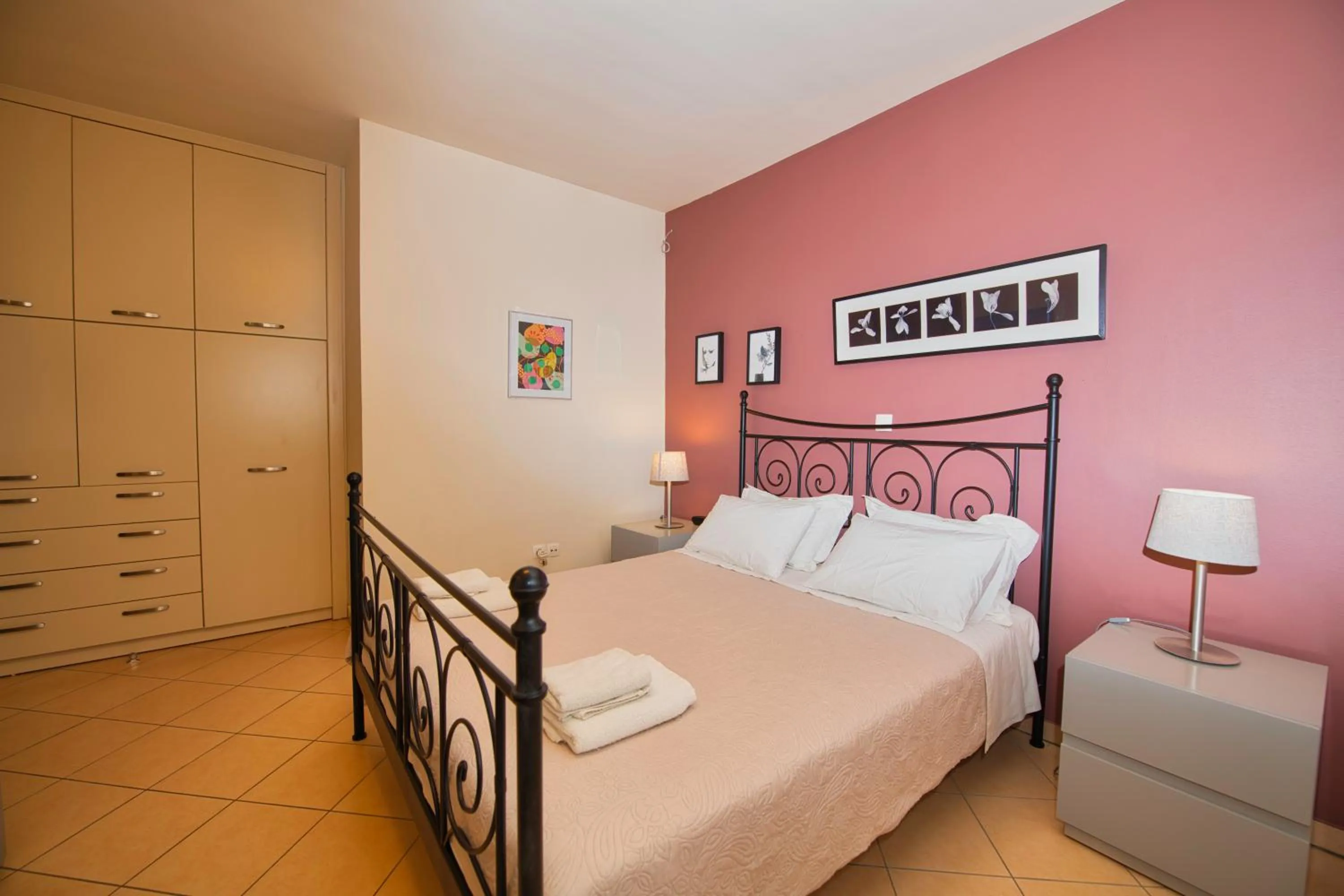 Bed in Marini Luxury Apartments and Suites