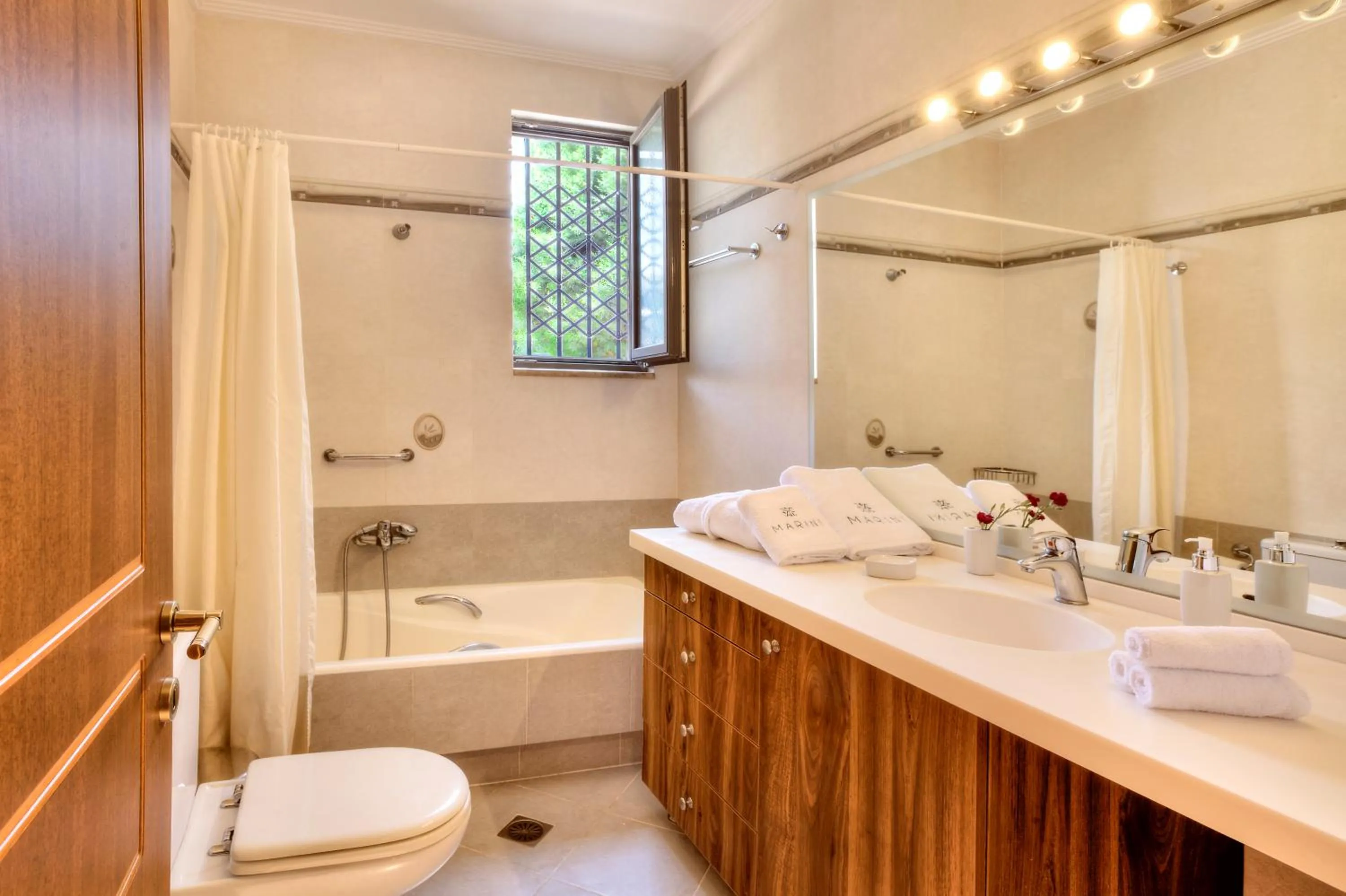 Bathroom in Marini Luxury Apartments and Suites