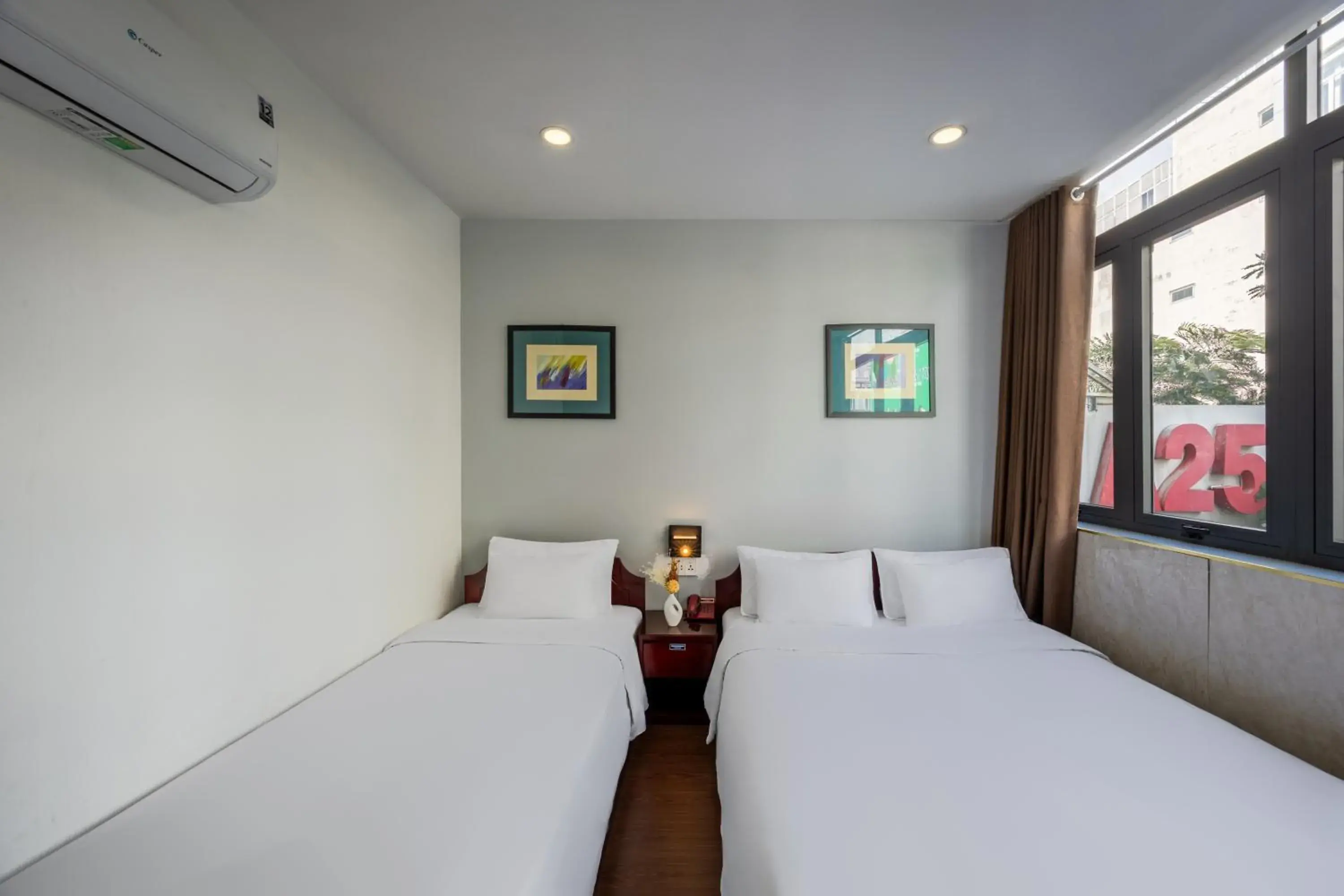 Bed in A25 Hotel - 25 Trương Định Bed in A25 Hotel - 25 Trương Định