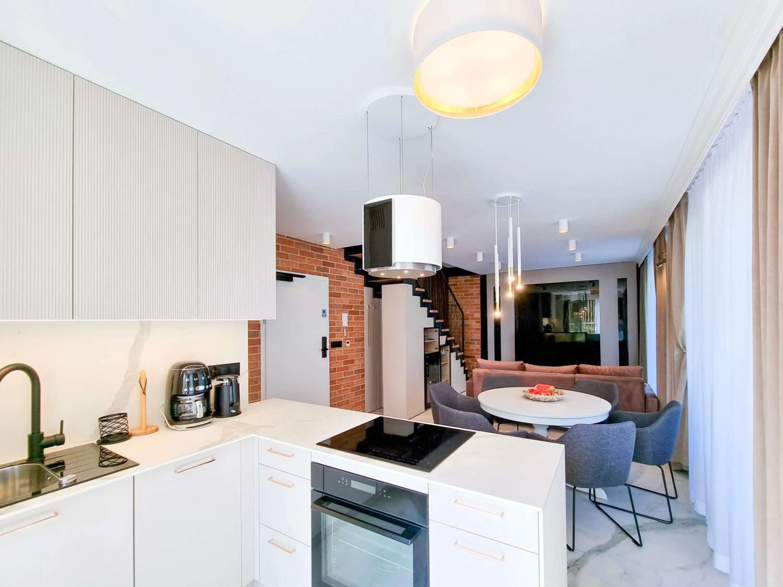 Kitchen or kitchenette in visit baltic - Apartament Plażowy Casa