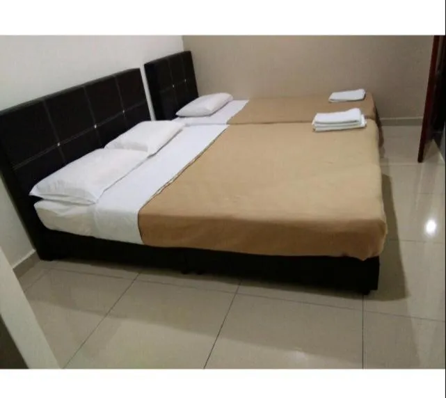 Bed in Semerah Suites Homestay