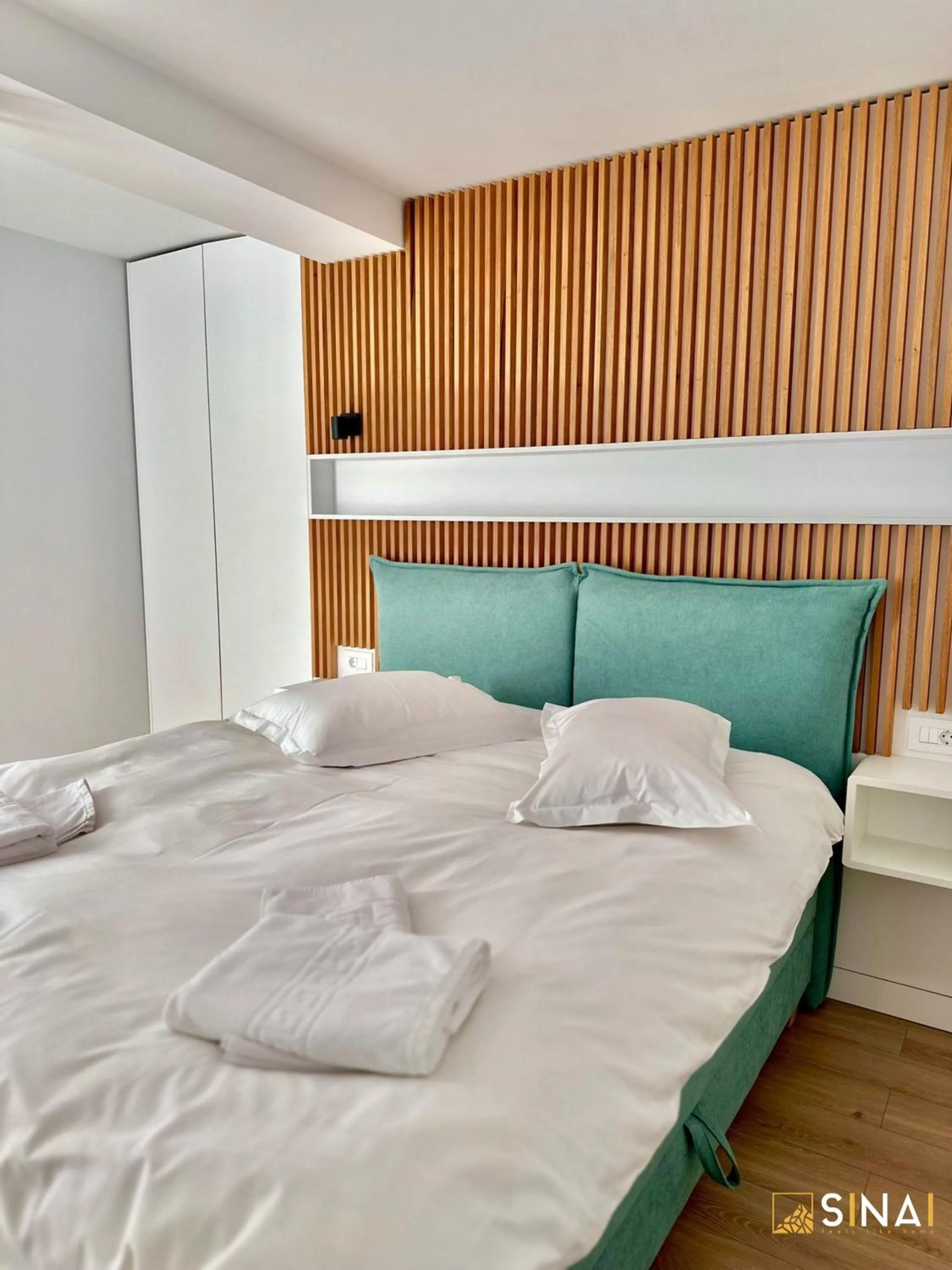 Bed in SINAI APH Apartments