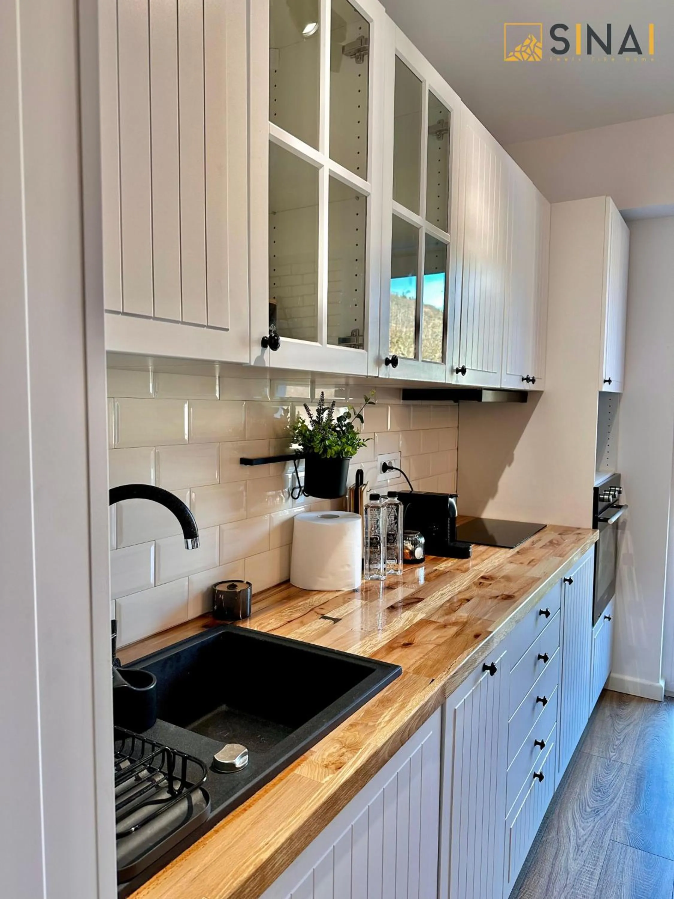 Kitchen or kitchenette in SINAI APH Apartments