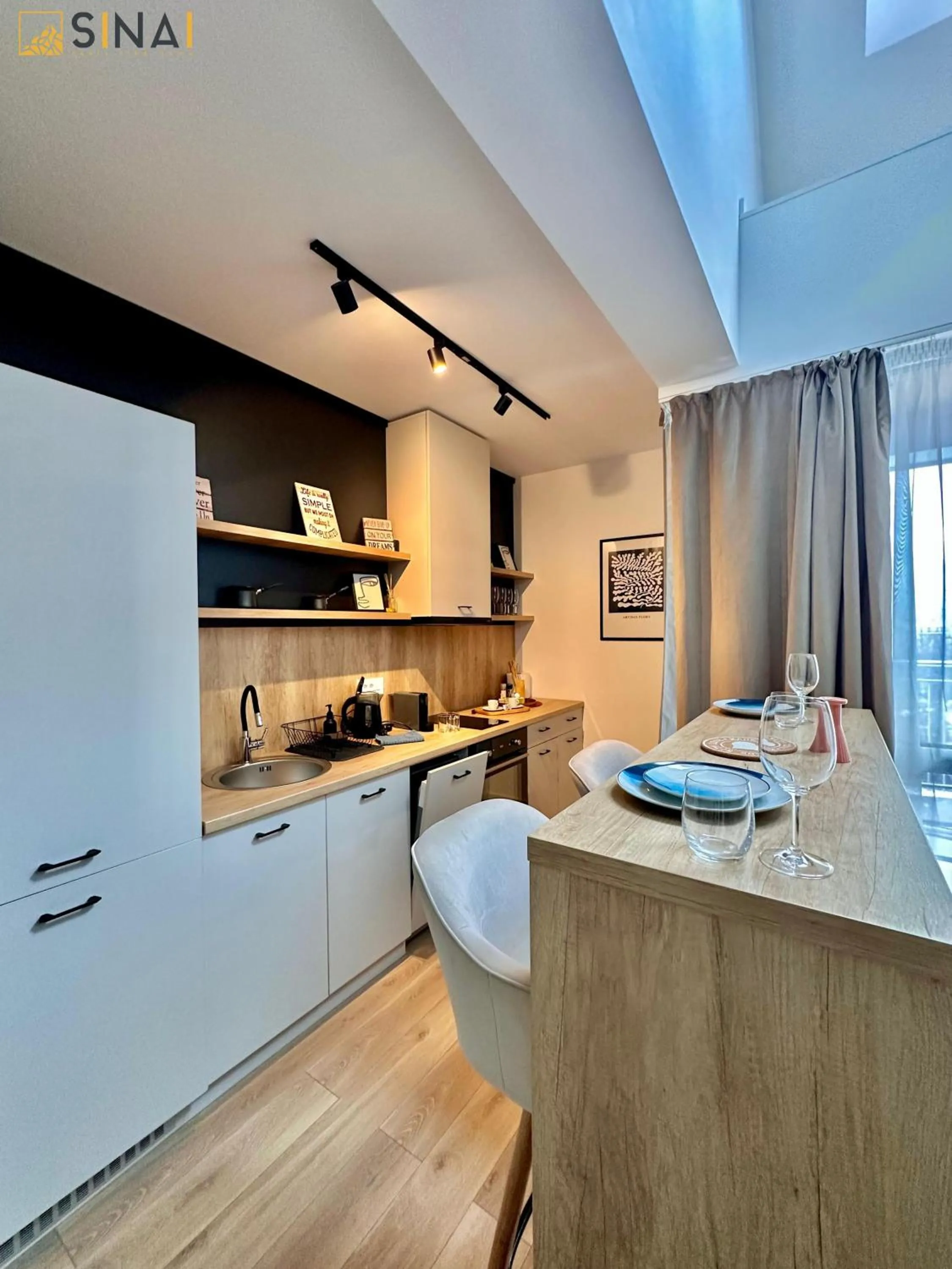 Kitchen or kitchenette in SINAI APH Apartments