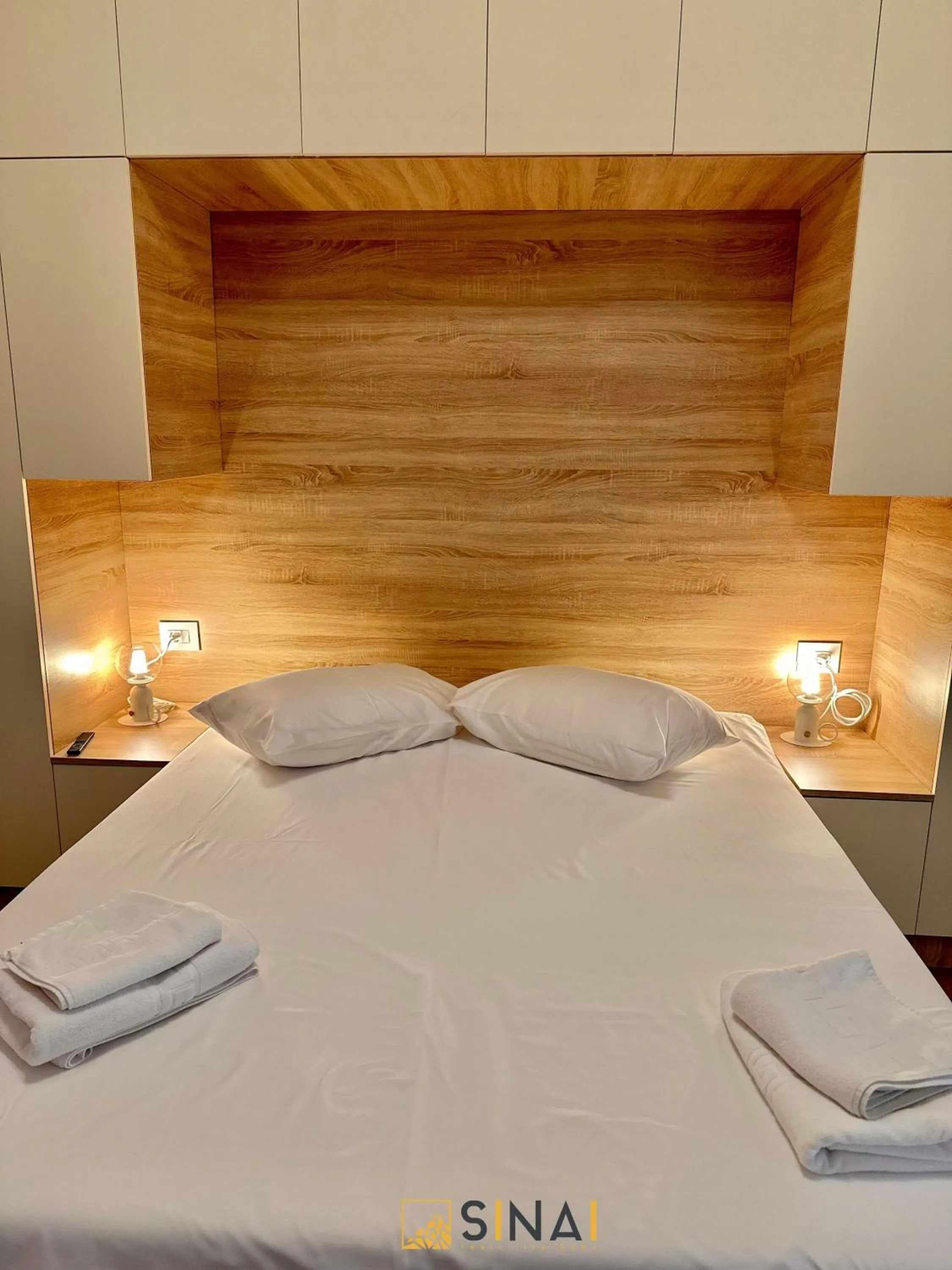 Bed in SINAI APH Apartments