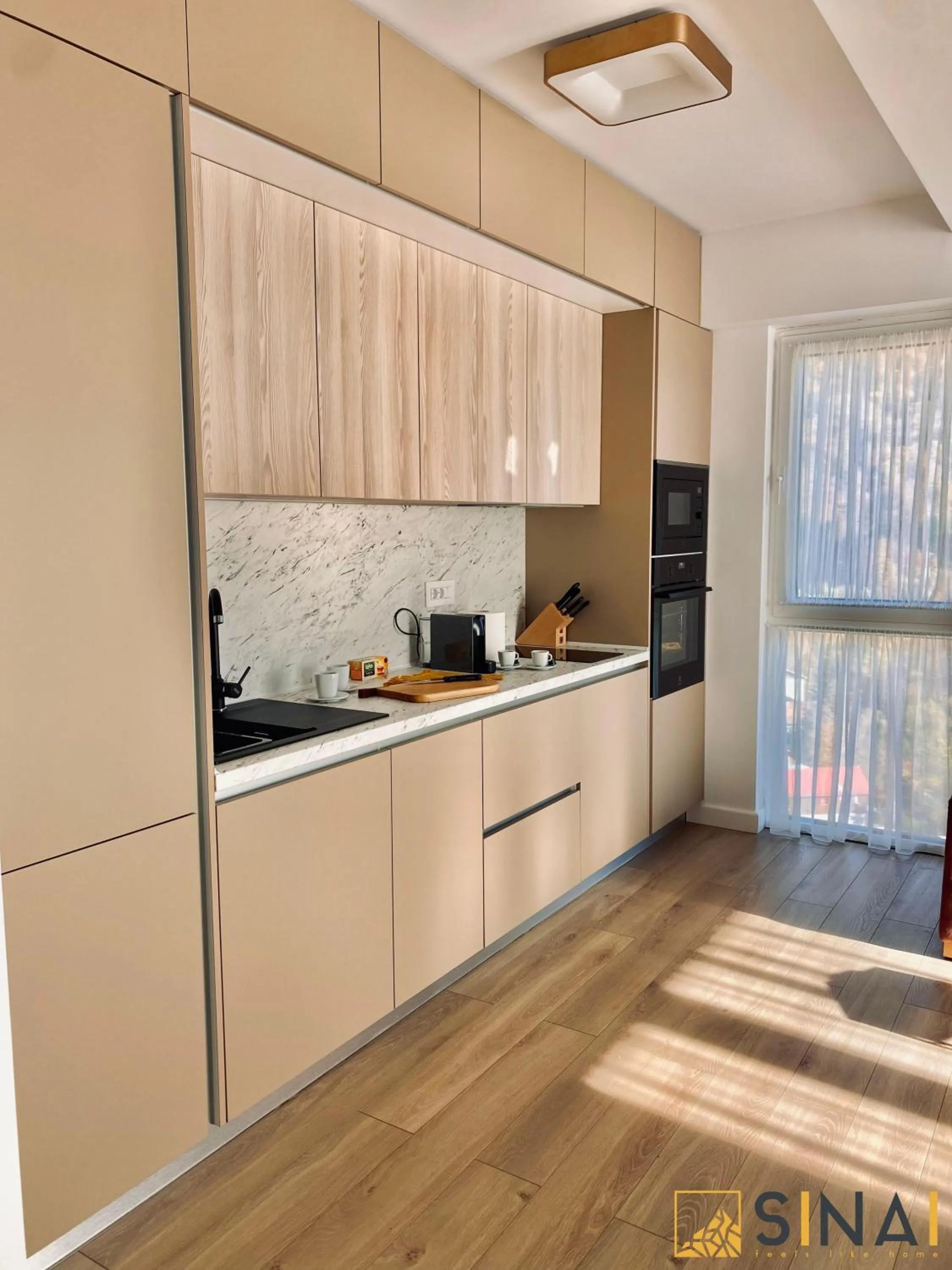 Kitchen or kitchenette in SINAI APH Apartments