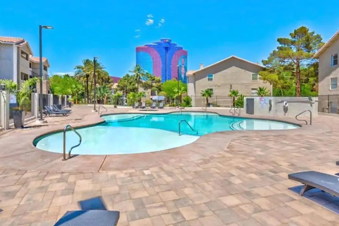 Property building in UPGRADED & STYLISH, POOL, HOT TUB, WALK TO STRIP!