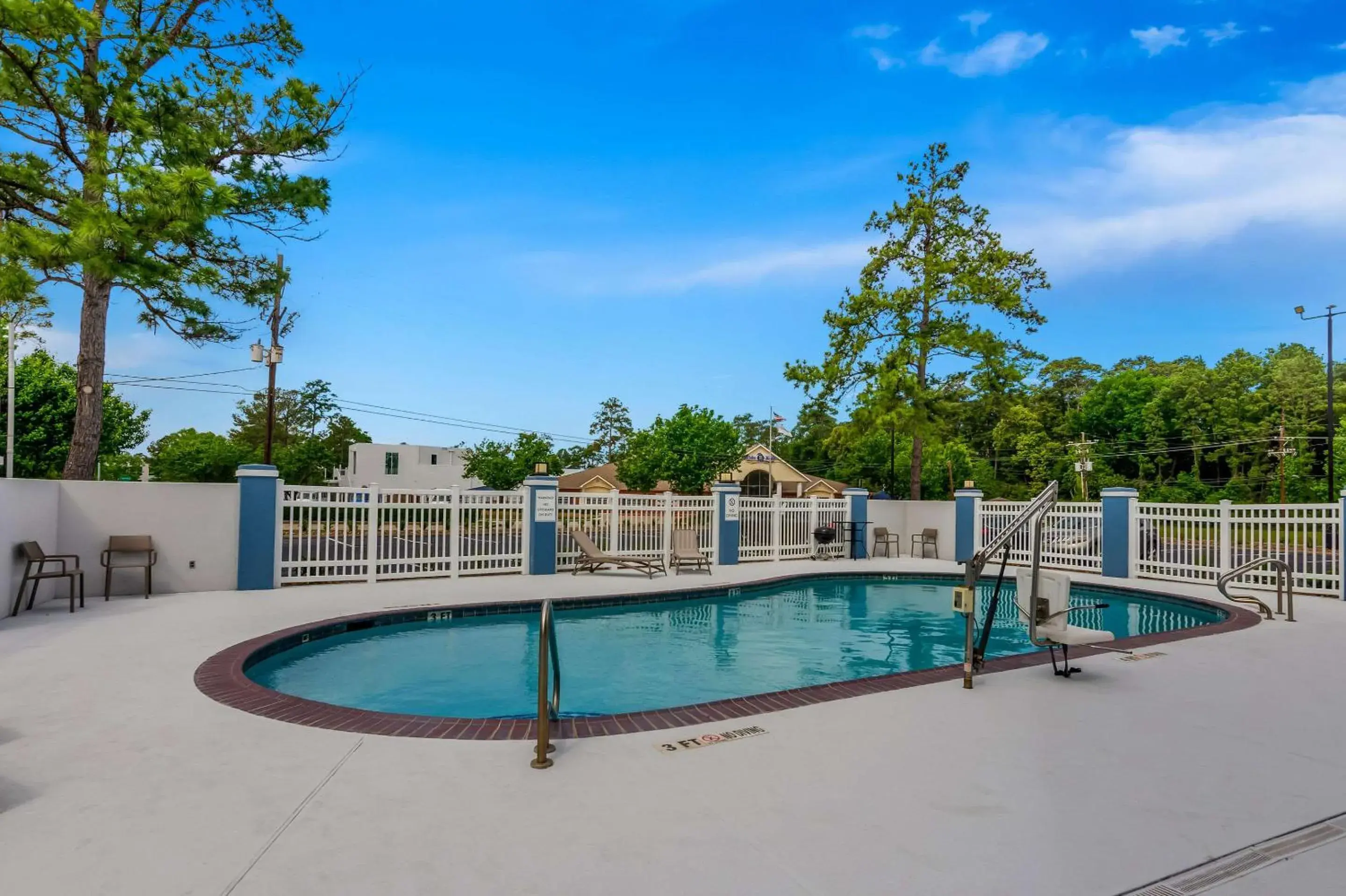 Swimming pool in Baymont by Wyndham Conroe Swimming pool in Baymont by Wyndham Conroe