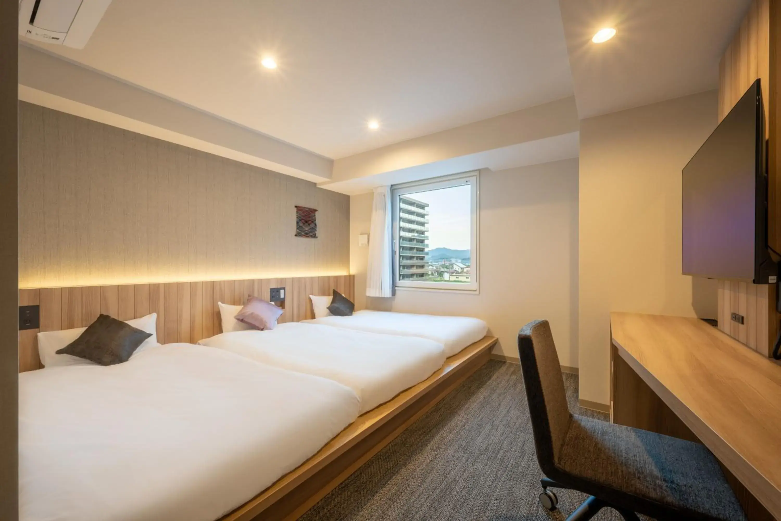 Bed in SAKURA PORT HOTEL Bed in SAKURA PORT HOTEL