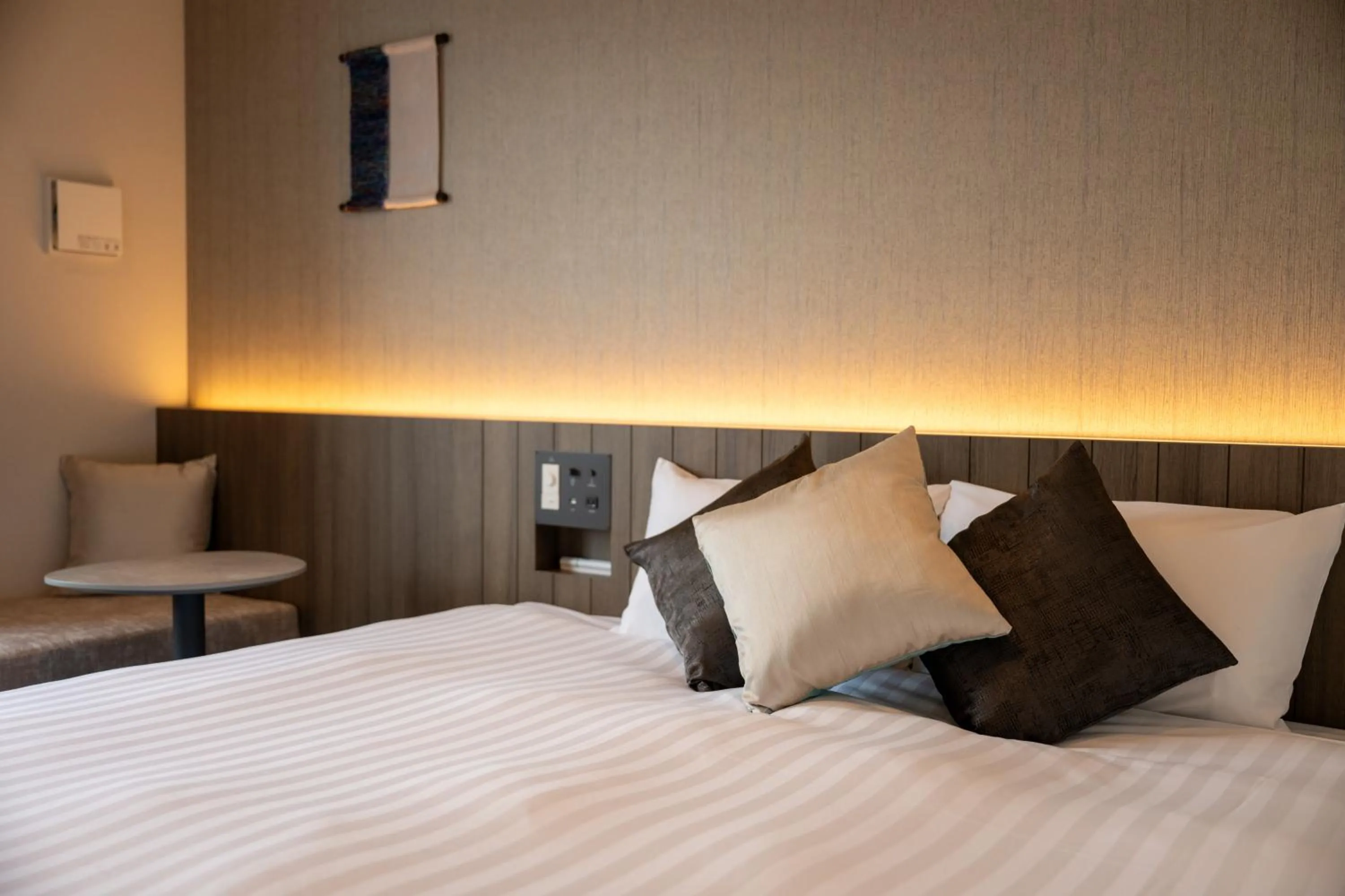 Bed in SAKURA PORT HOTEL