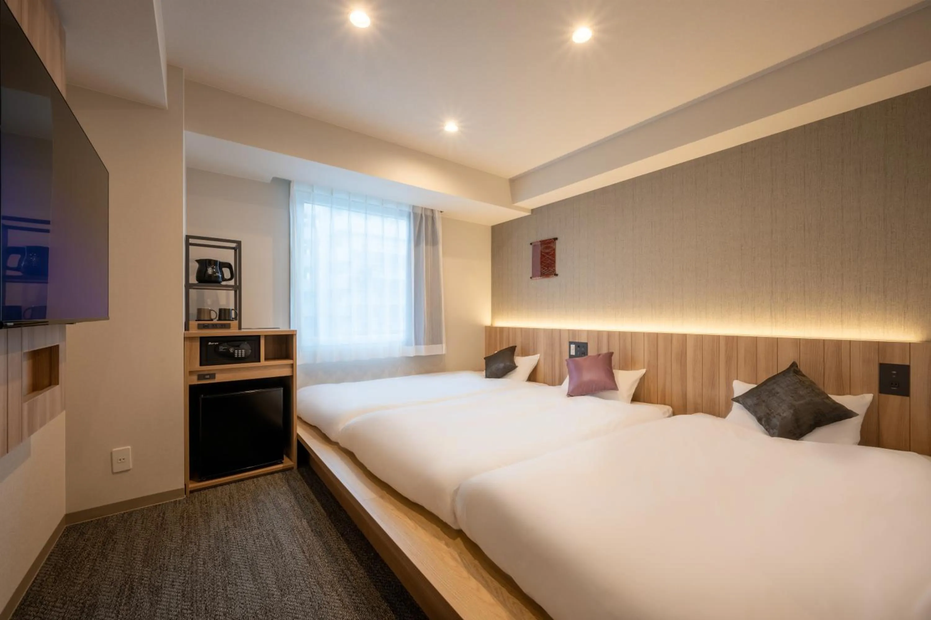 Bed in SAKURA PORT HOTEL