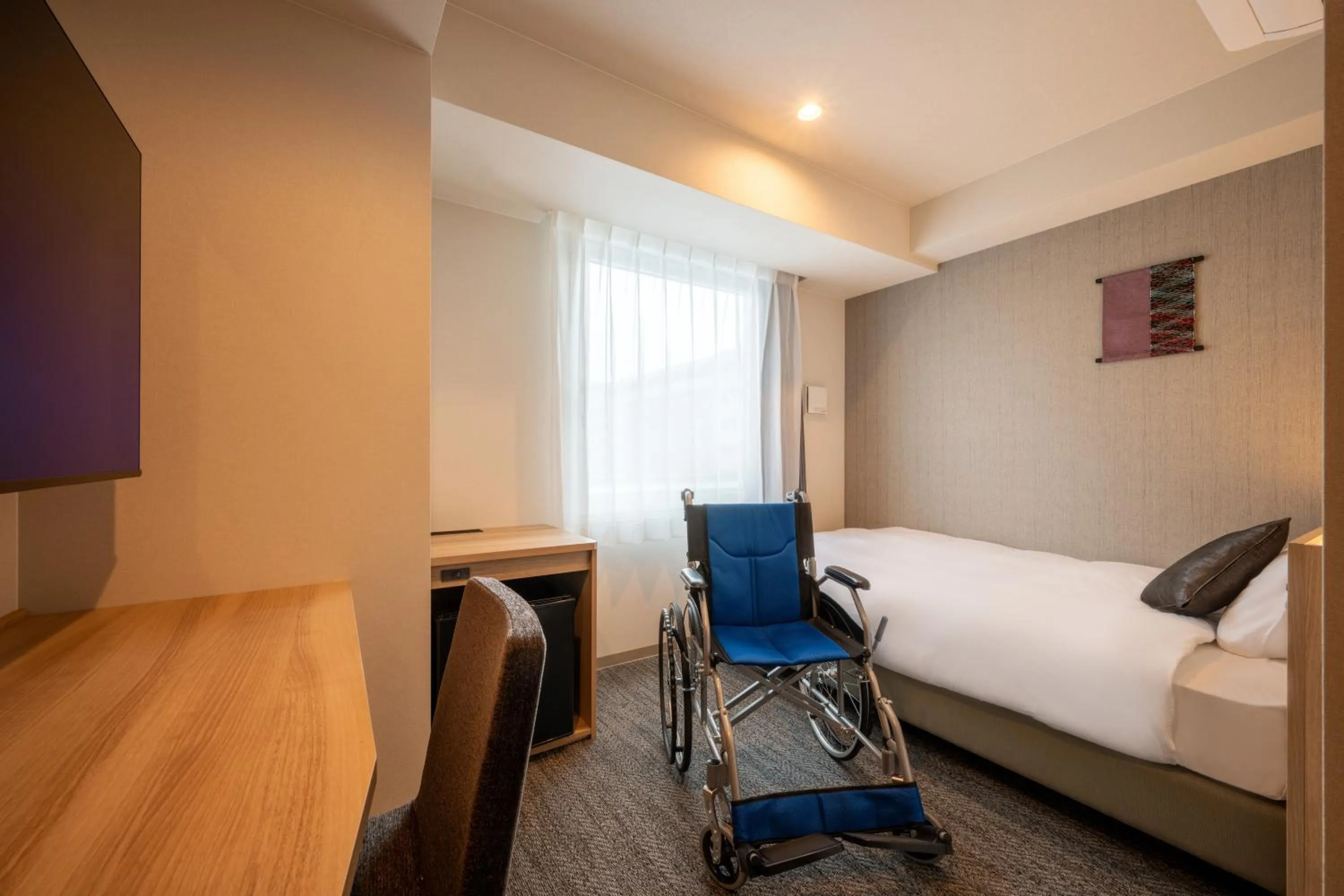 Bed in SAKURA PORT HOTEL