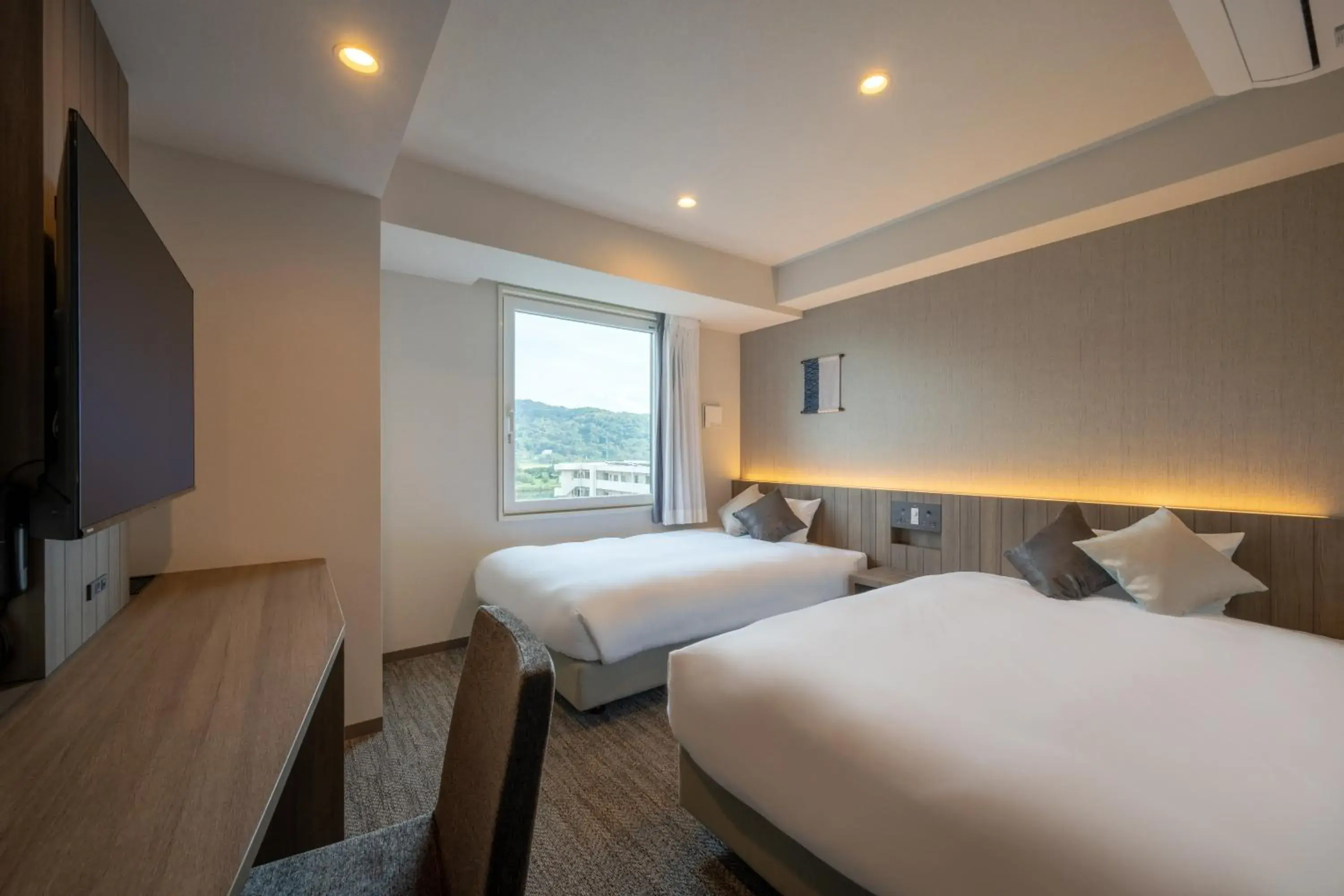 Bed in SAKURA PORT HOTEL Bed in SAKURA PORT HOTEL