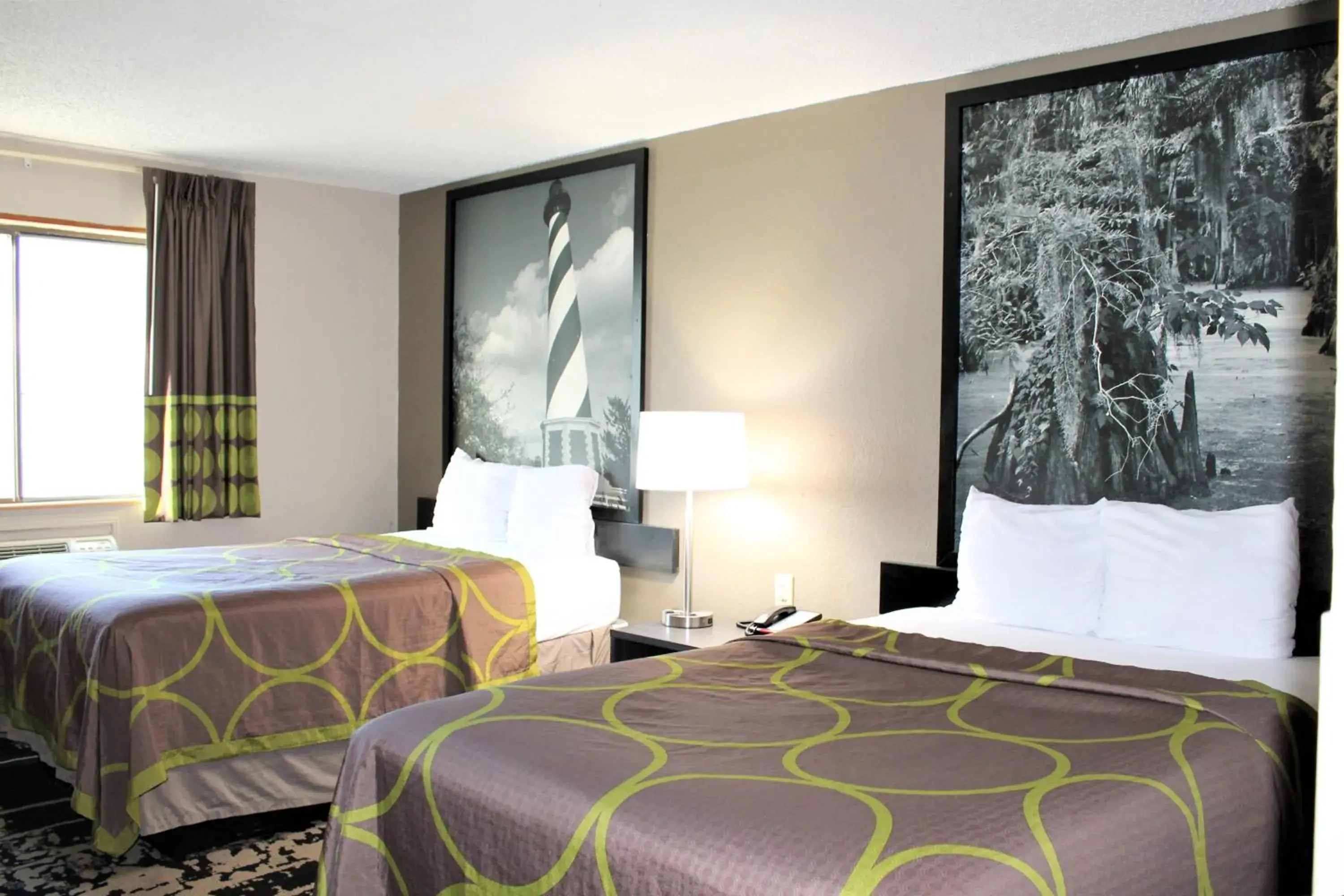 Bed in Super 8 by Wyndham Greensboro/Coliseum/Conv. Bed in Super 8 by Wyndham Greensboro/Coliseum/Conv.