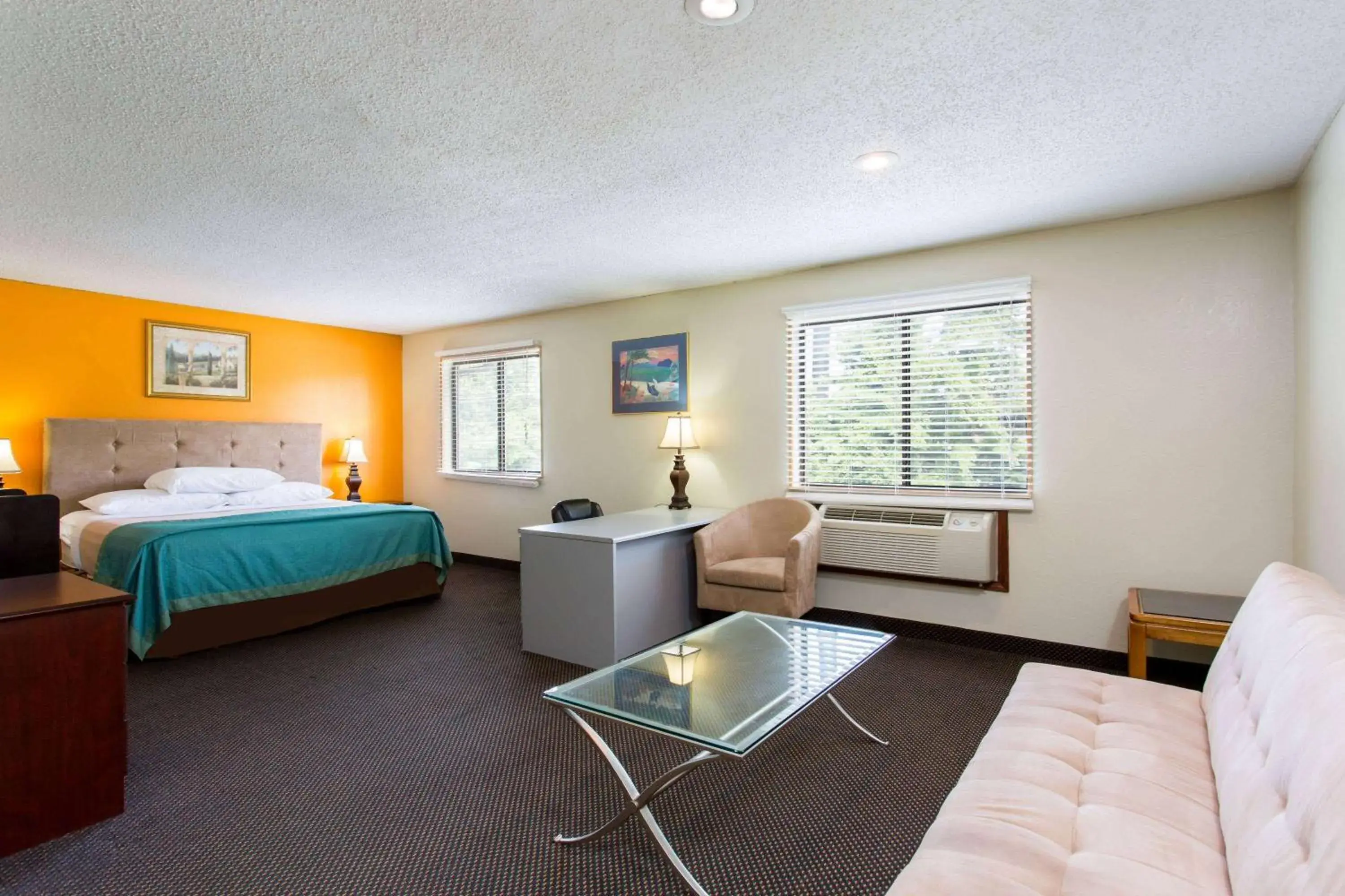Bed in Super 8 by Wyndham Greensboro/Coliseum/Conv. Bed in Super 8 by Wyndham Greensboro/Coliseum/Conv.