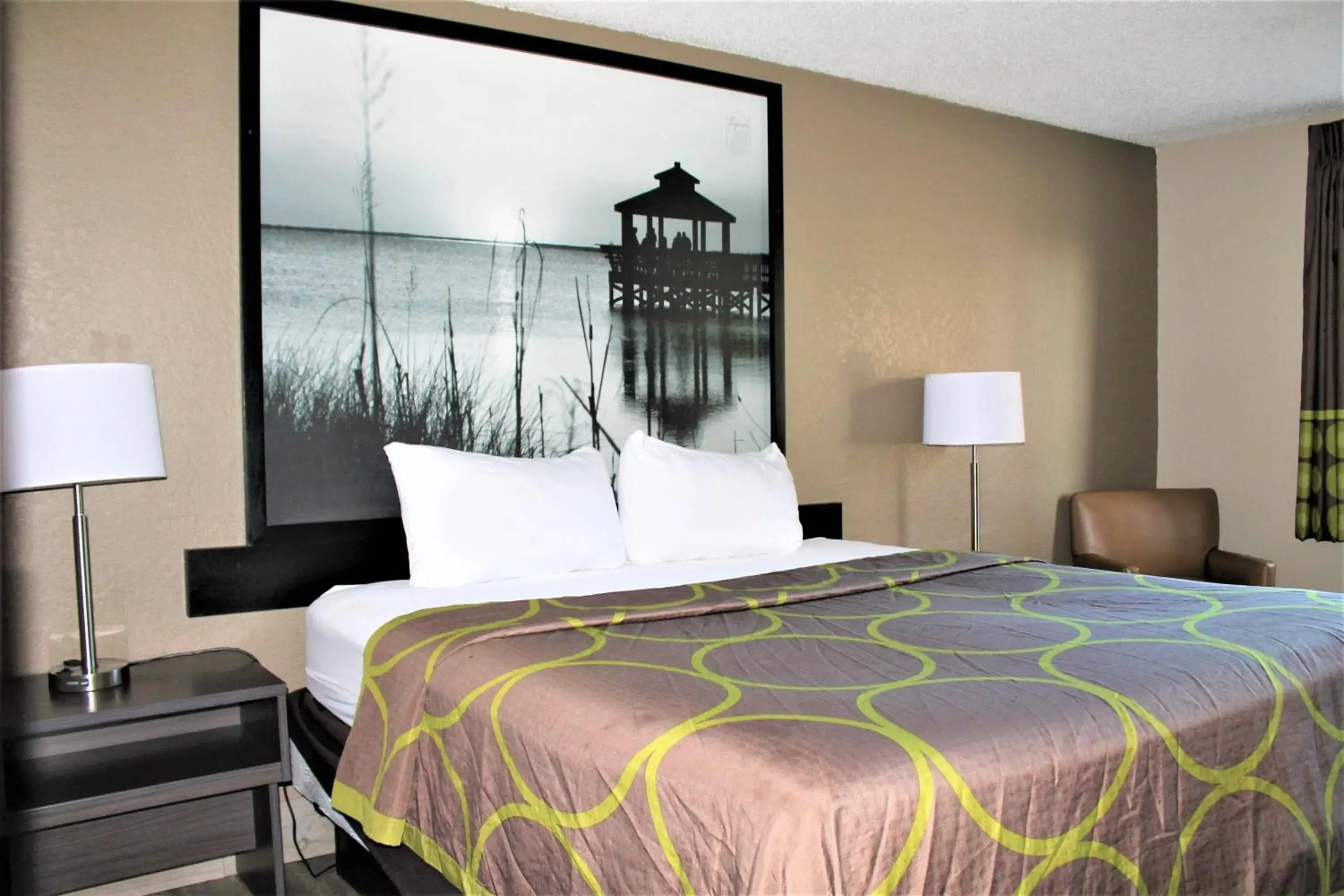 Bed in Super 8 by Wyndham Greensboro/Coliseum/Conv. Bed in Super 8 by Wyndham Greensboro/Coliseum/Conv.