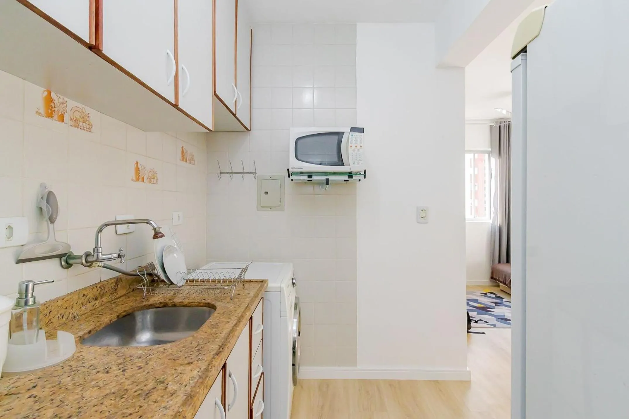 Kitchen or kitchenette in Ed. Vitoria | Bairro mais requisitado de Curitiba | Gonzaga Stays