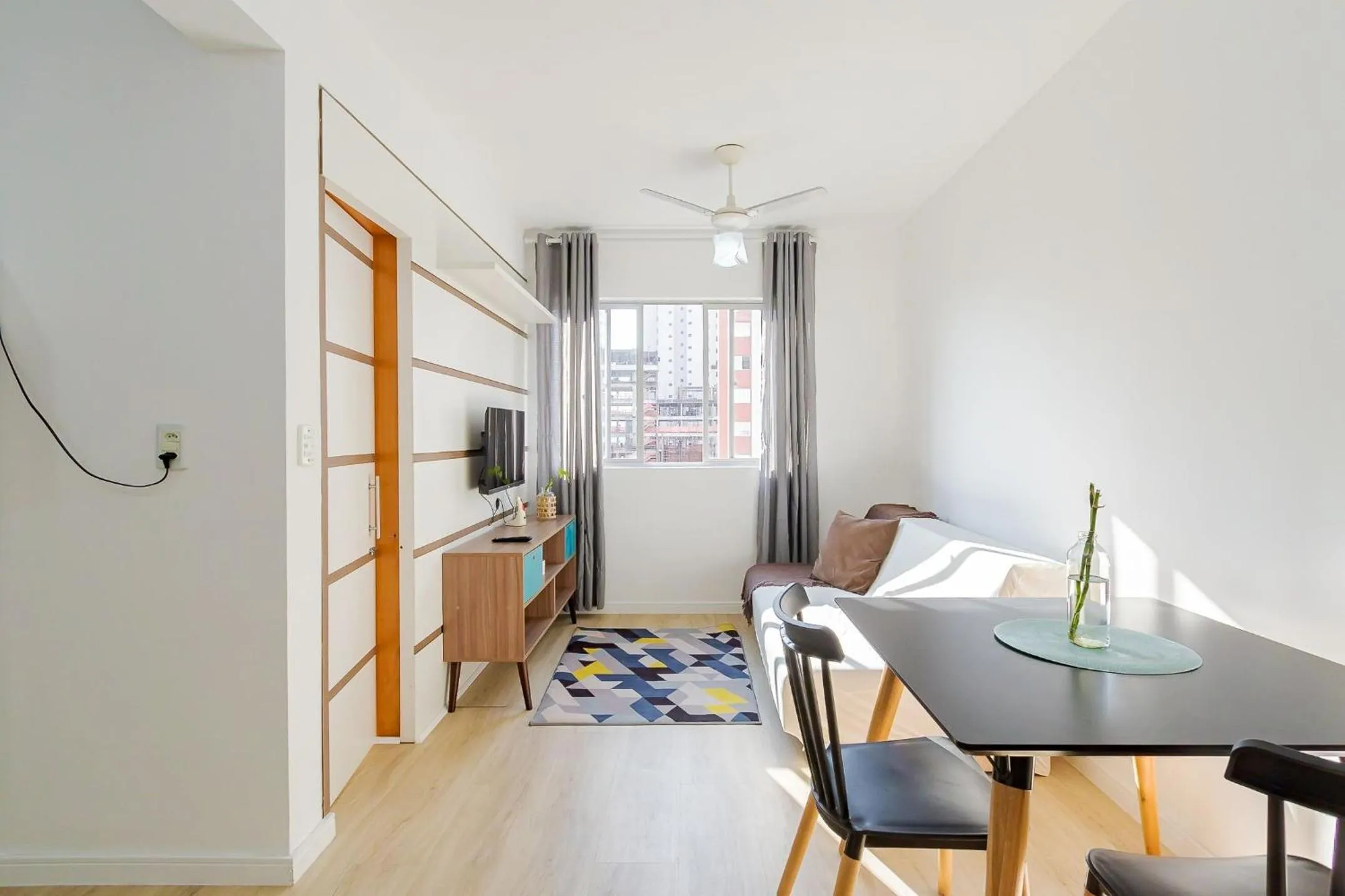 Living room in Ed. Vitoria | Bairro mais requisitado de Curitiba | Gonzaga Stays