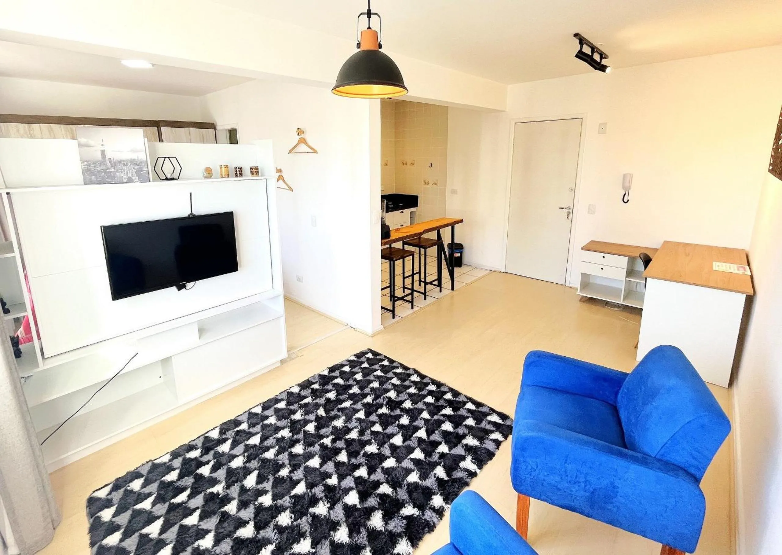 Living room in Ed. Vitoria | Bairro mais requisitado de Curitiba | Gonzaga Stays