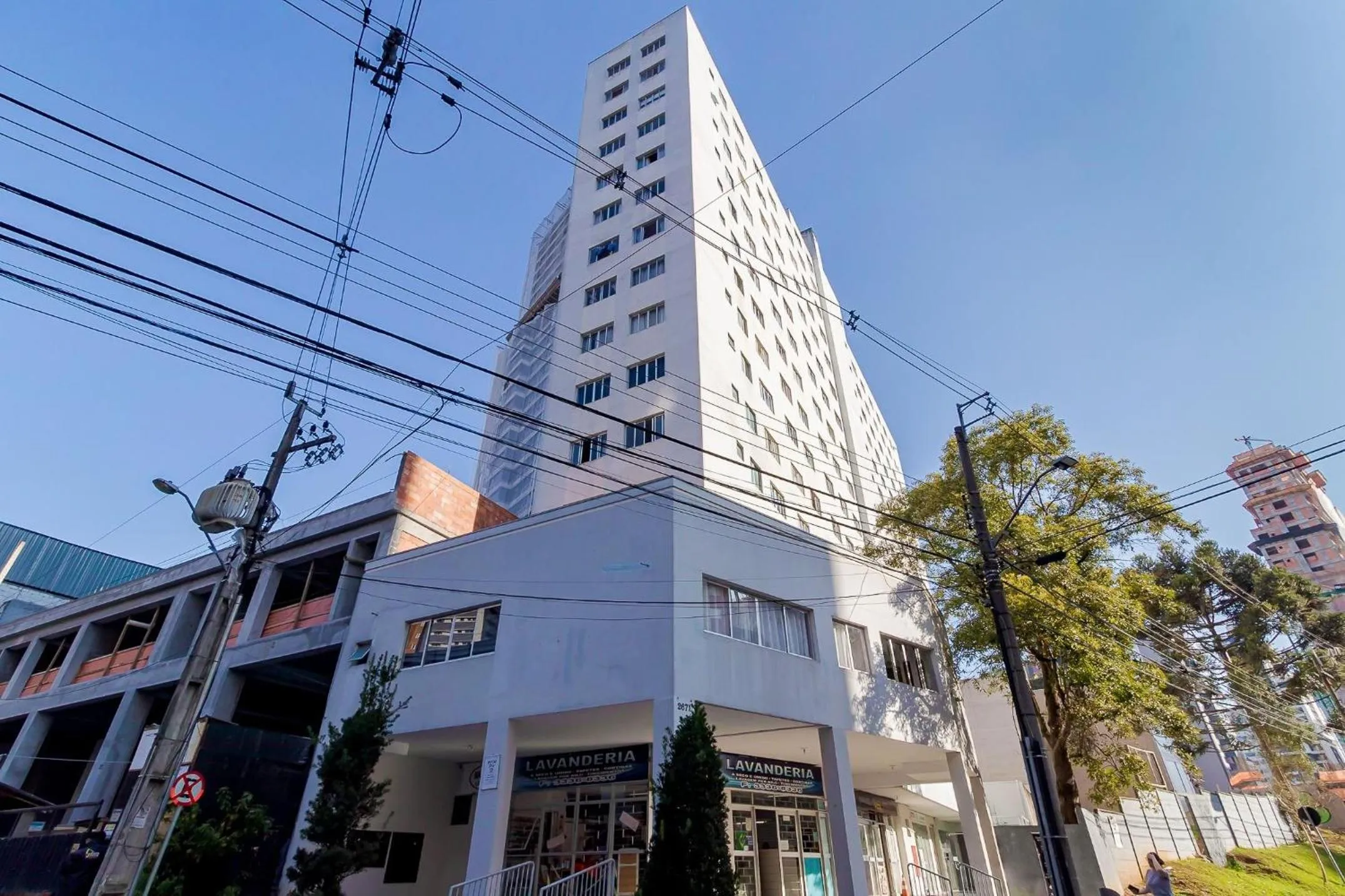 Facade/entrance in Ed. Vitoria | Bairro mais requisitado de Curitiba | Gonzaga Stays