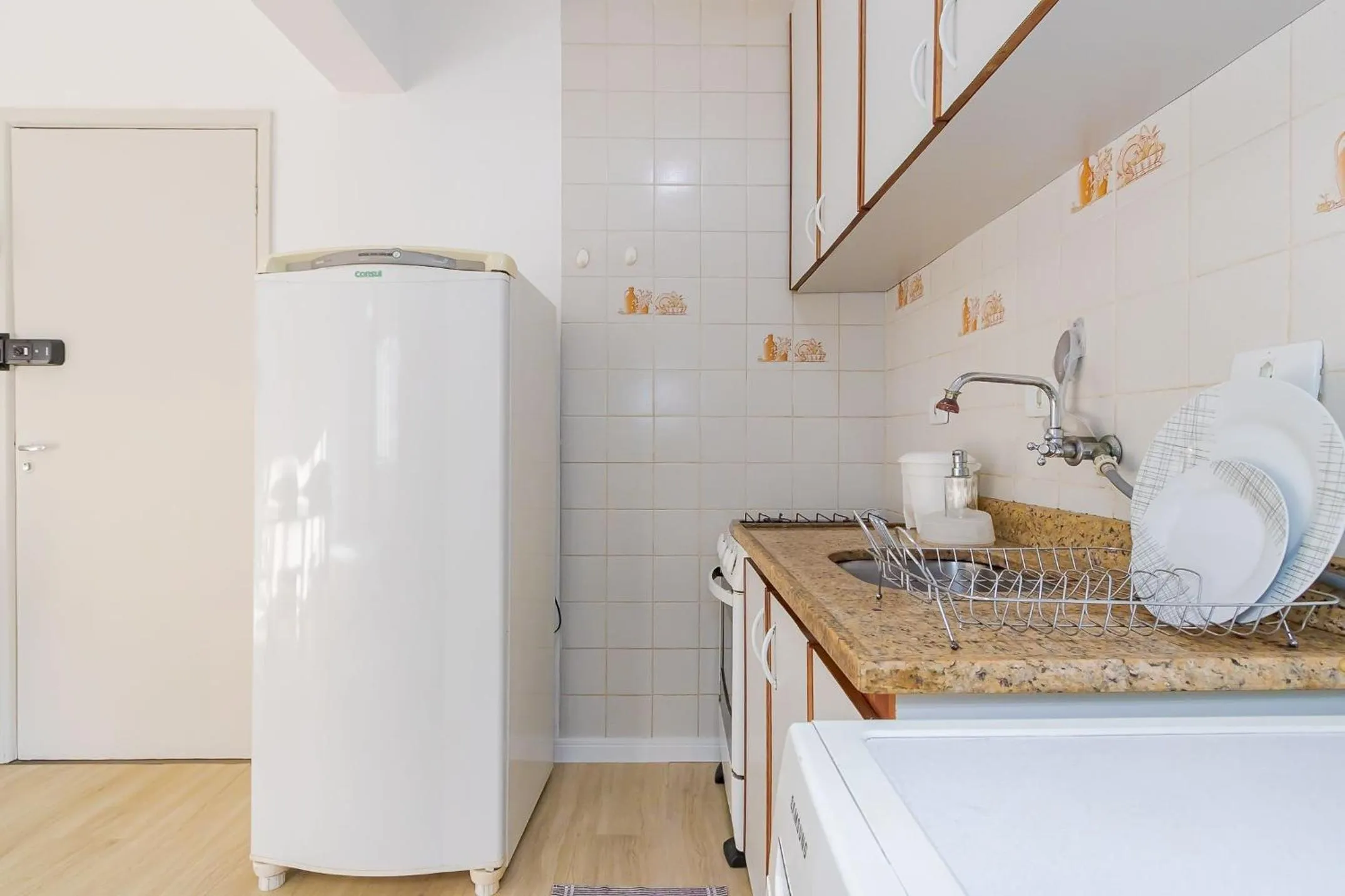 Kitchen or kitchenette in Ed. Vitoria | Bairro mais requisitado de Curitiba | Gonzaga Stays