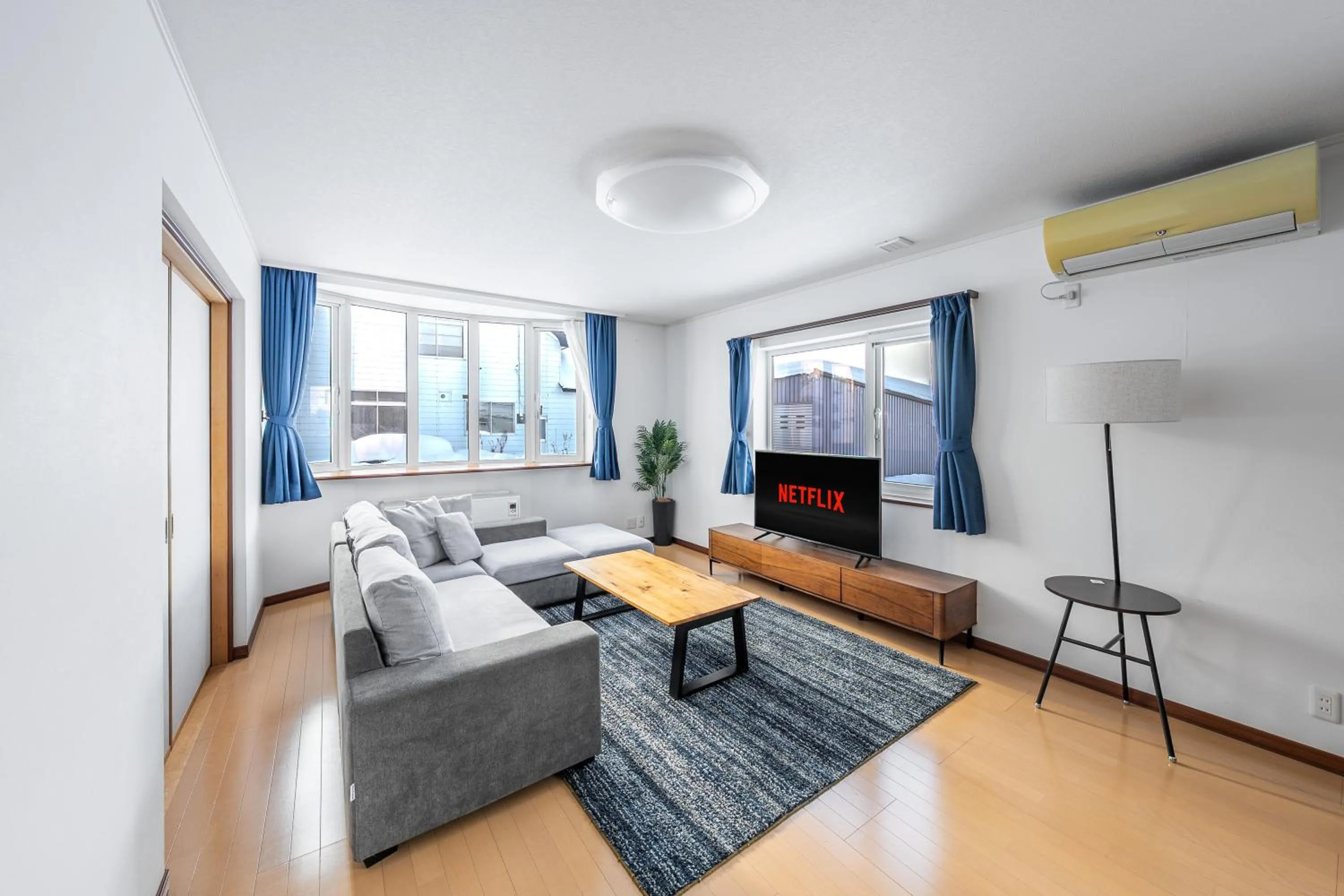 Living room, Bed in THE VILLA FURANO【Wide Horizon】