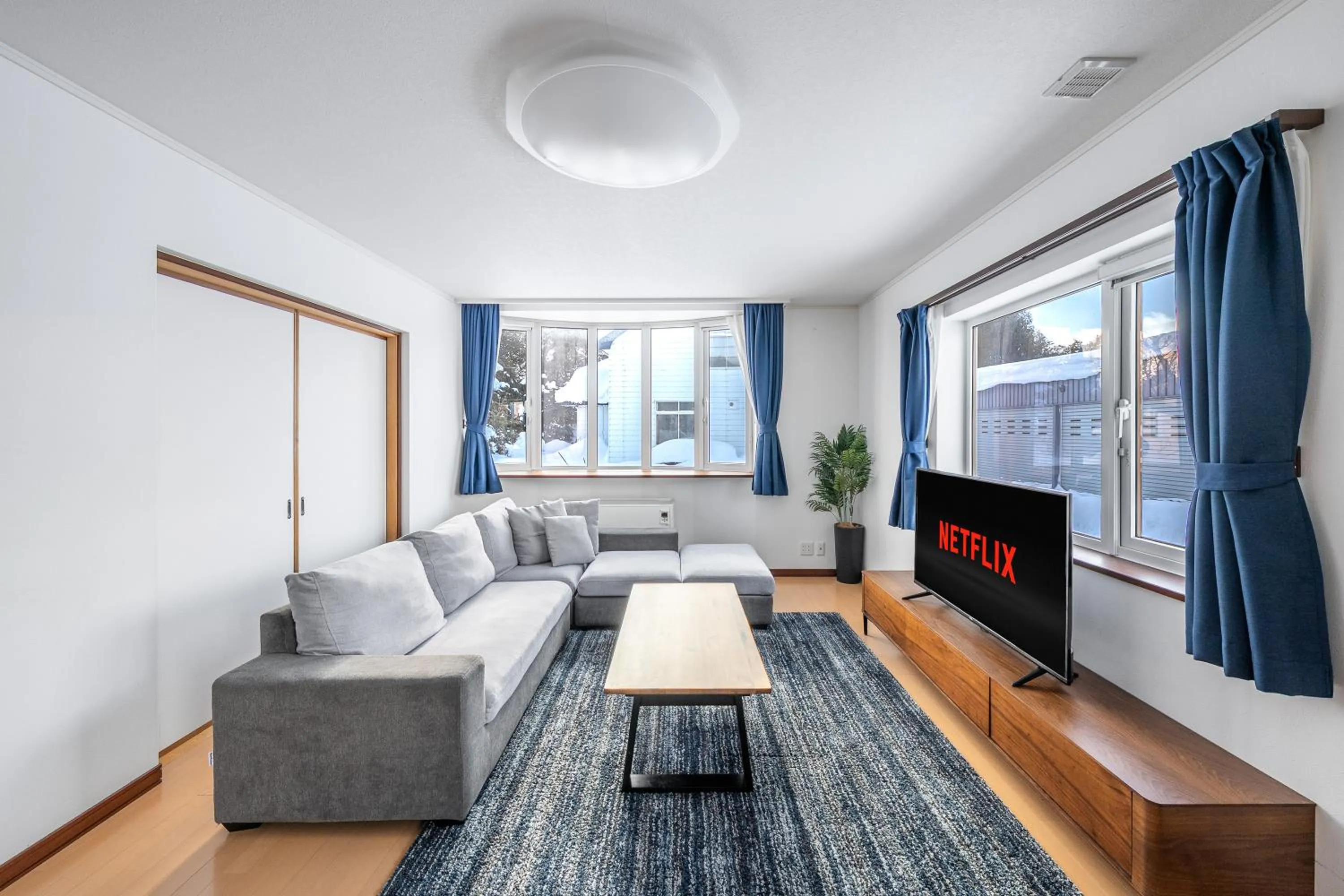 Living room, Bed in THE VILLA FURANO【Wide Horizon】