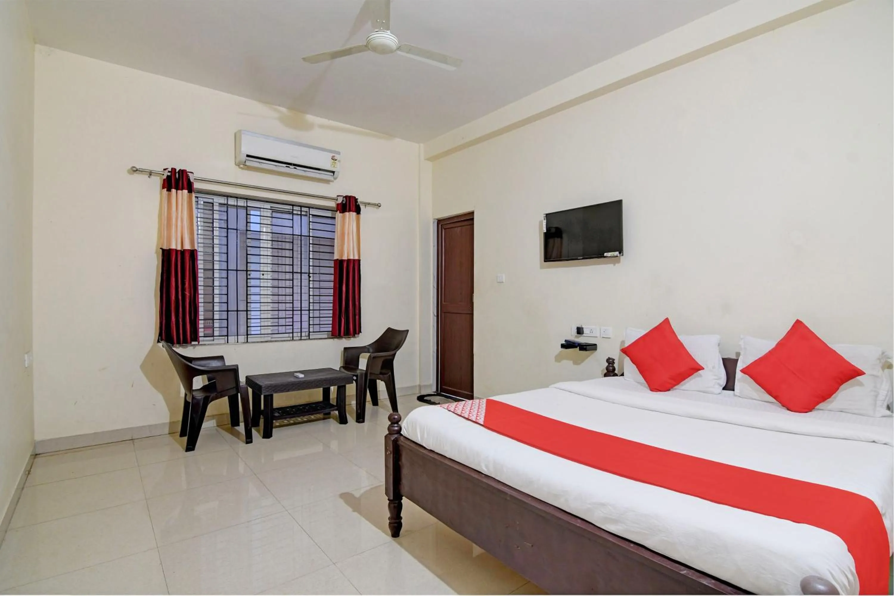 Bedroom in Hotel O Swiss stay