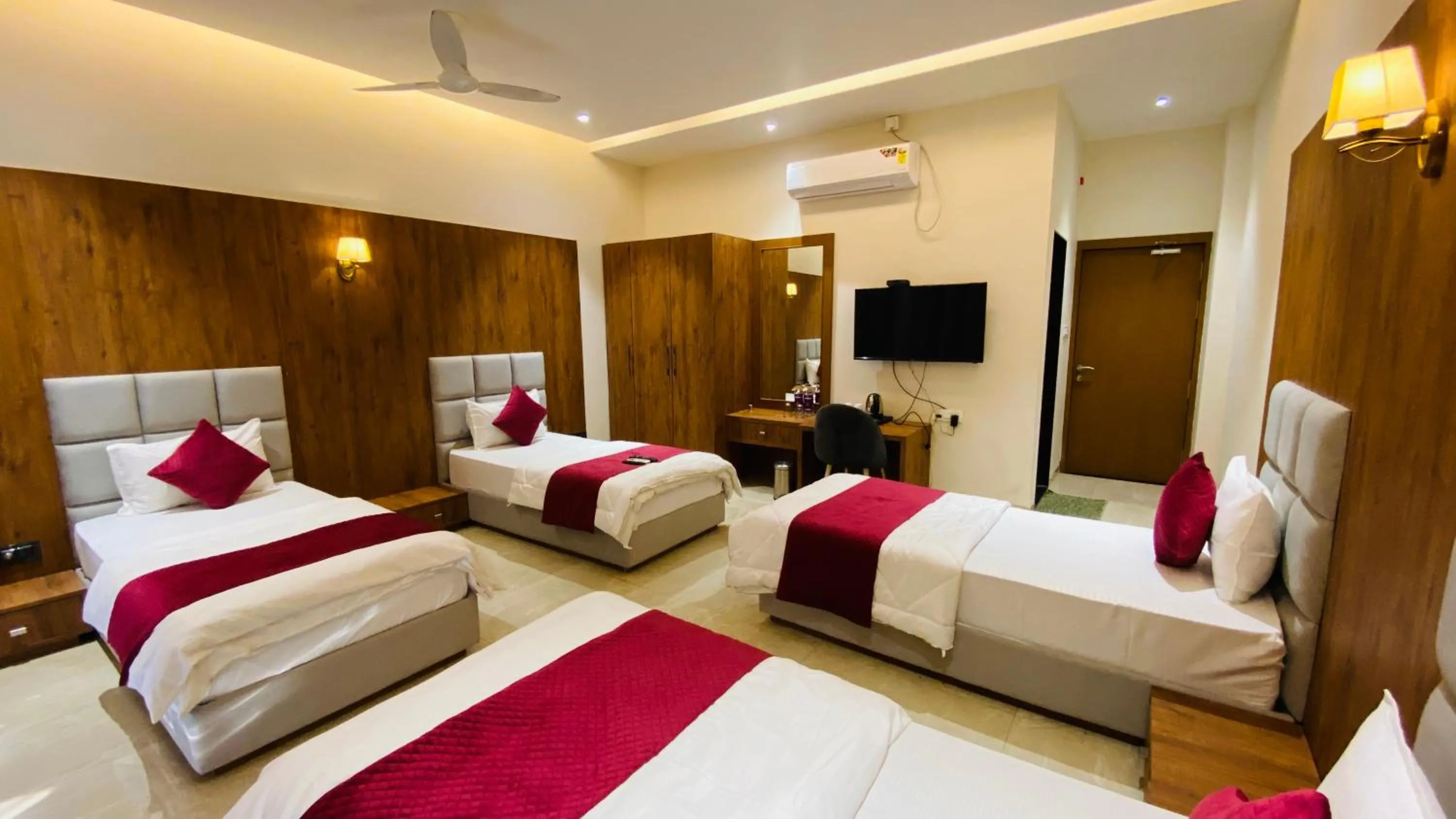 Bed in Gaurison Hotel and Resorts