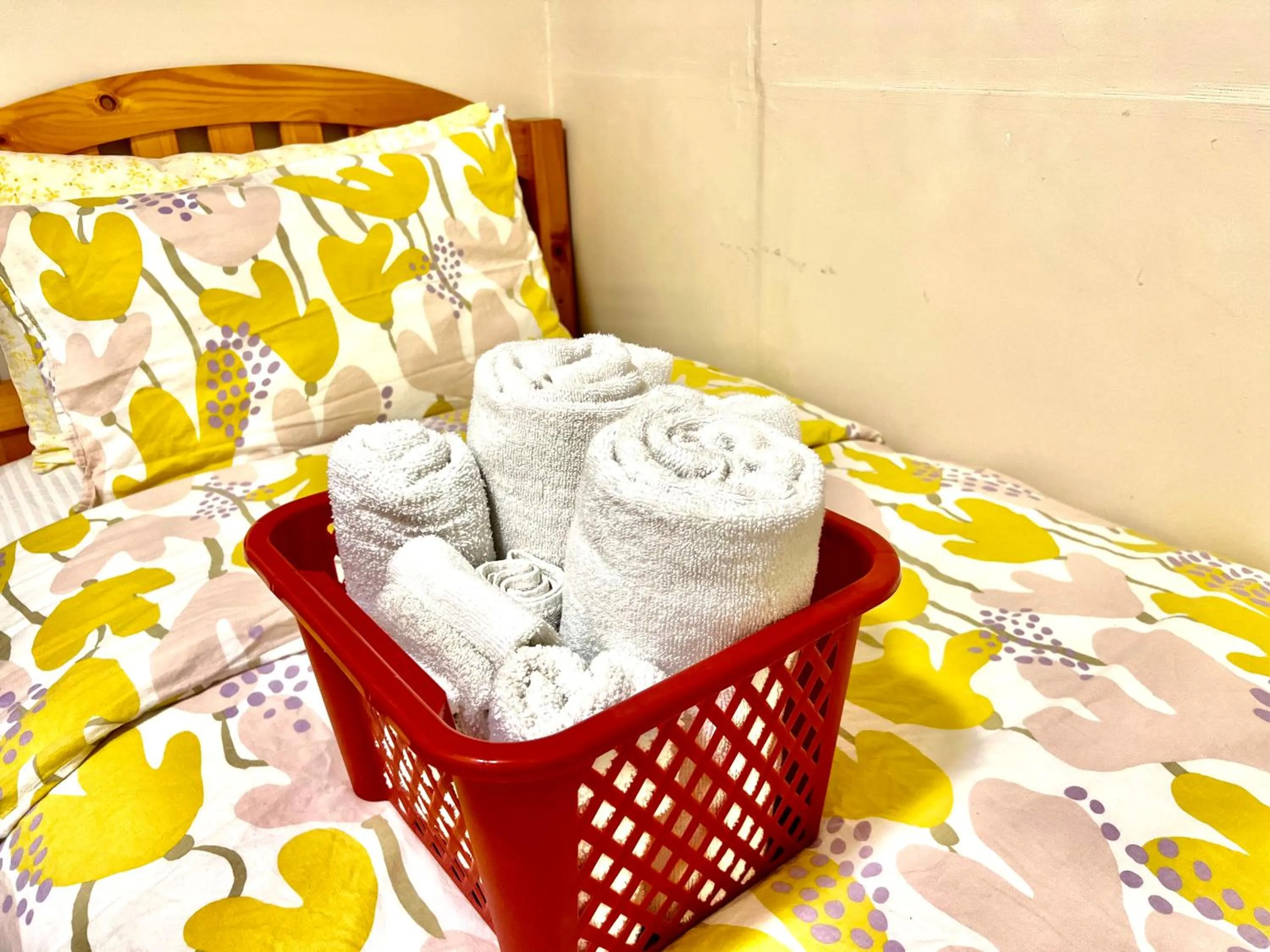 towels, Bed in Tiny Private Room at the Upper Level of a Big House with Shared Bathroom