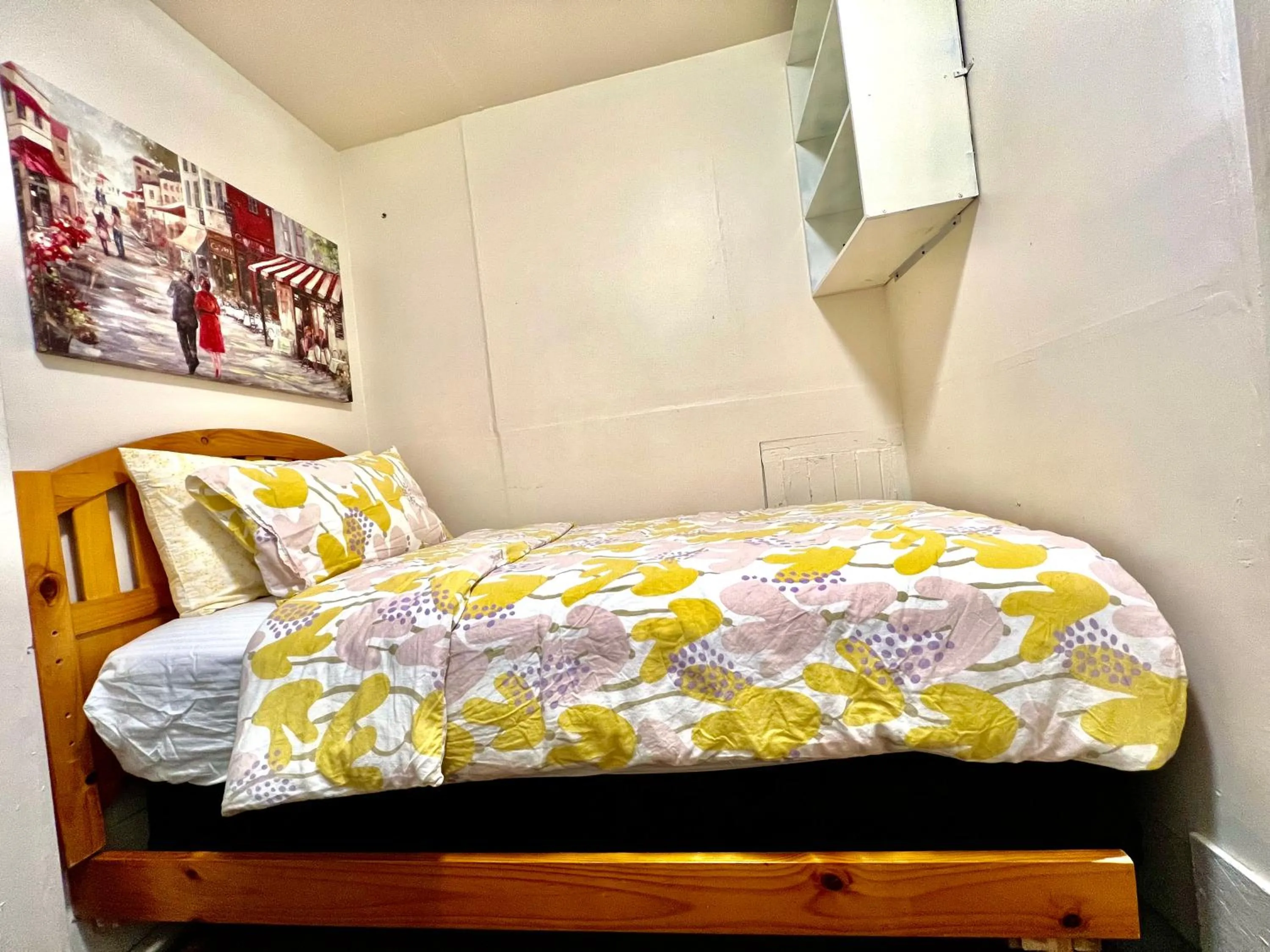 Bed in Tiny Private Room at the Upper Level of a Big House with Shared Bathroom