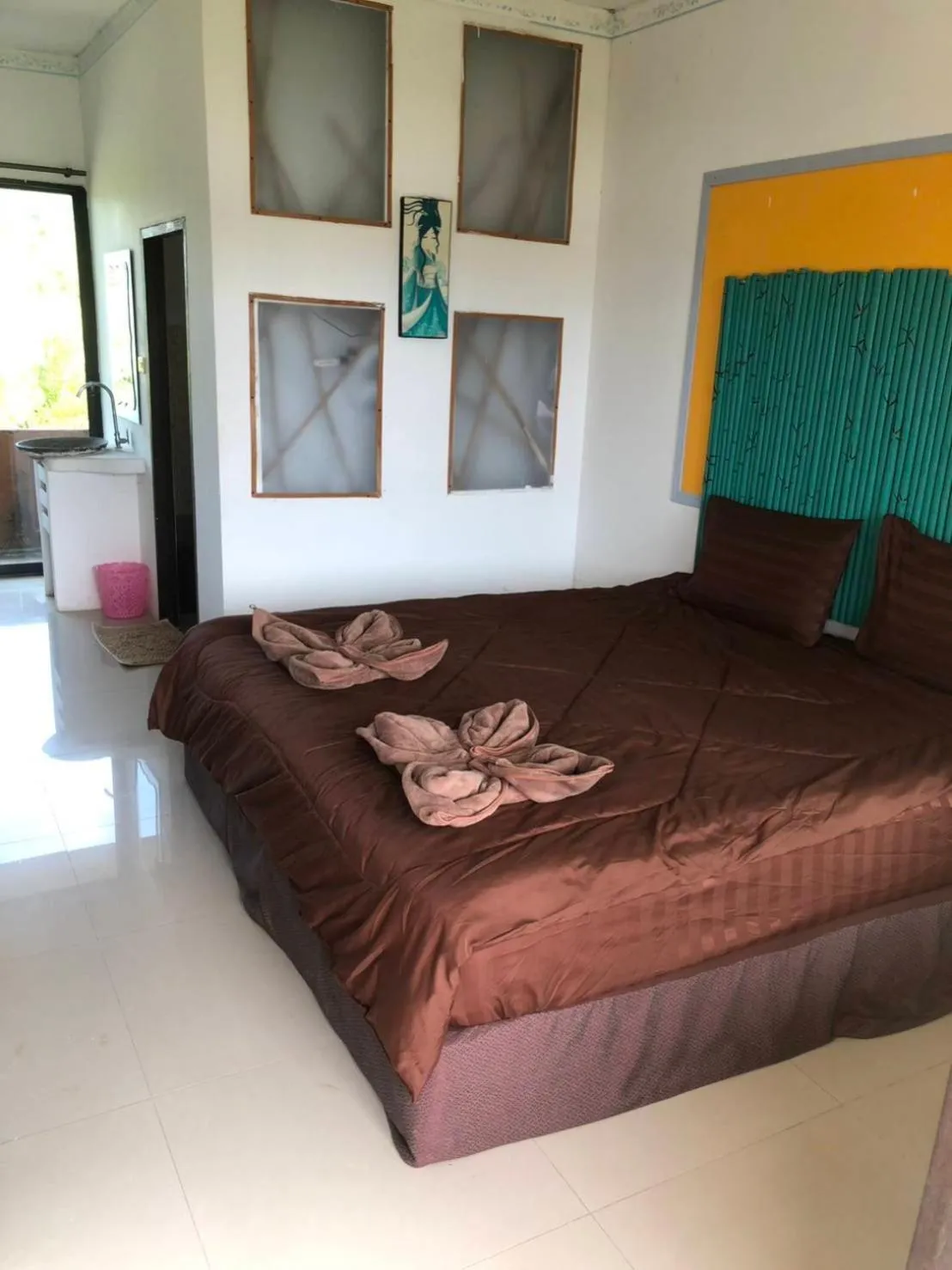 Bed in Petpumok Wangnamkhiao Hotel