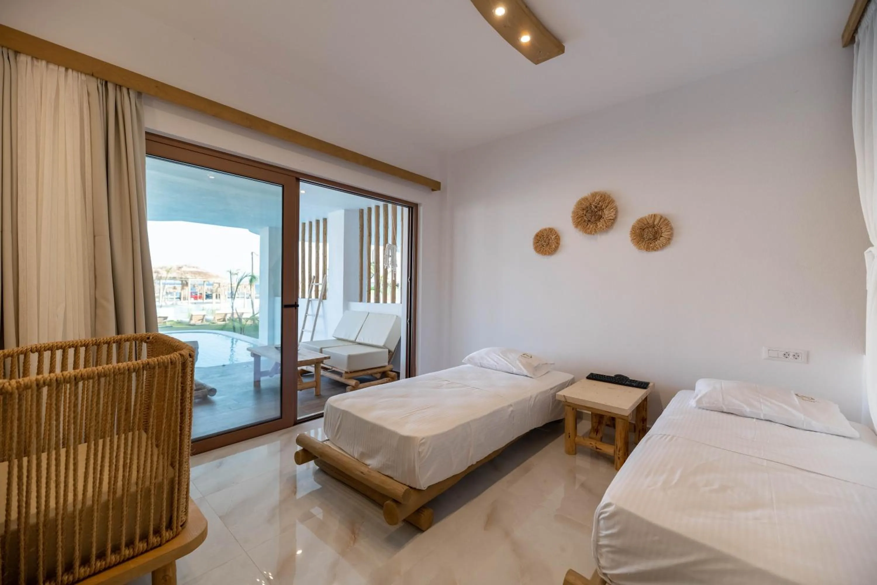 Bed in Alia Beachfront Suites and Spa