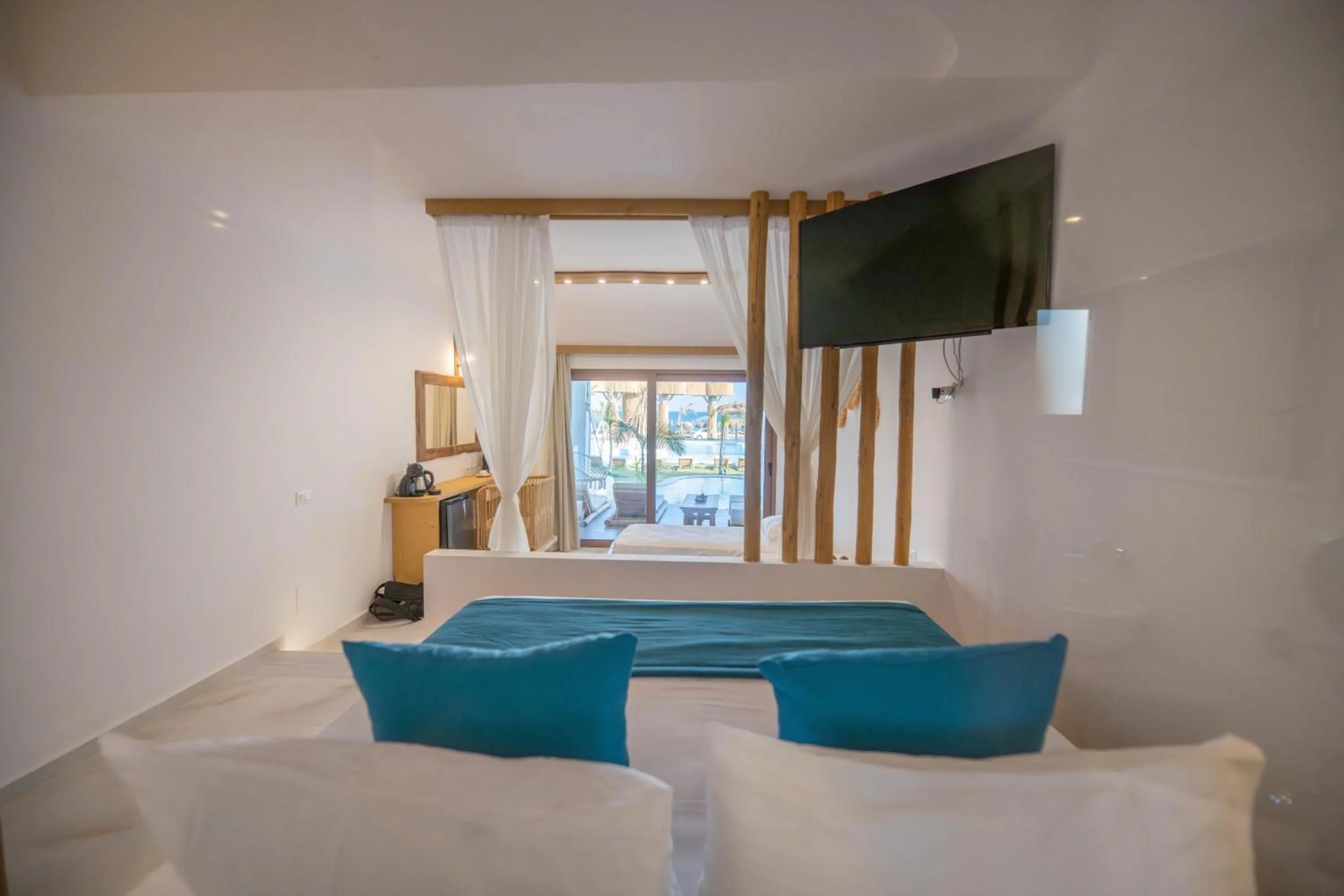 Bed in Alia Beachfront Suites and Spa