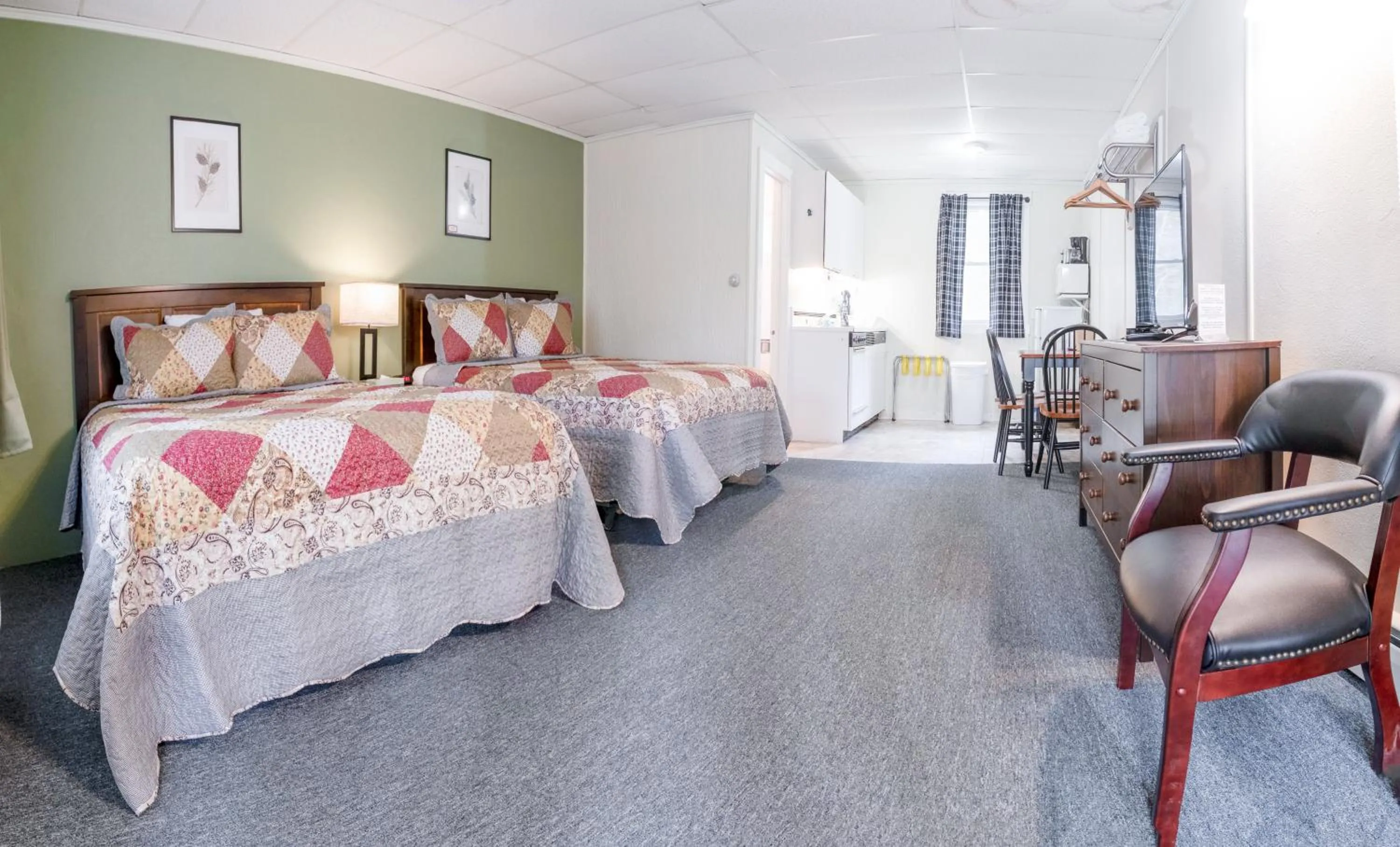 Bed in Acadia Pines Motel