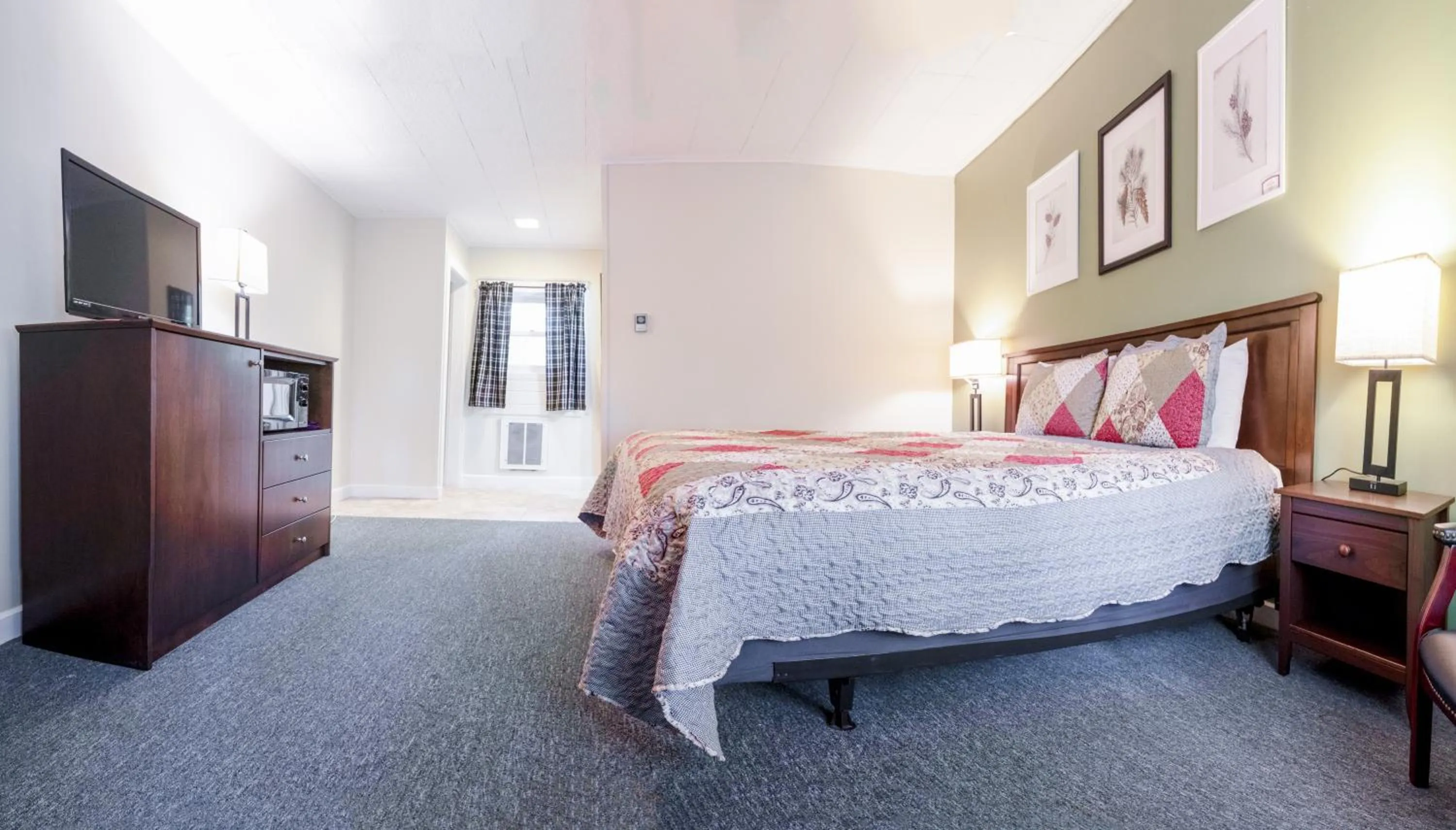 Bed in Acadia Pines Motel