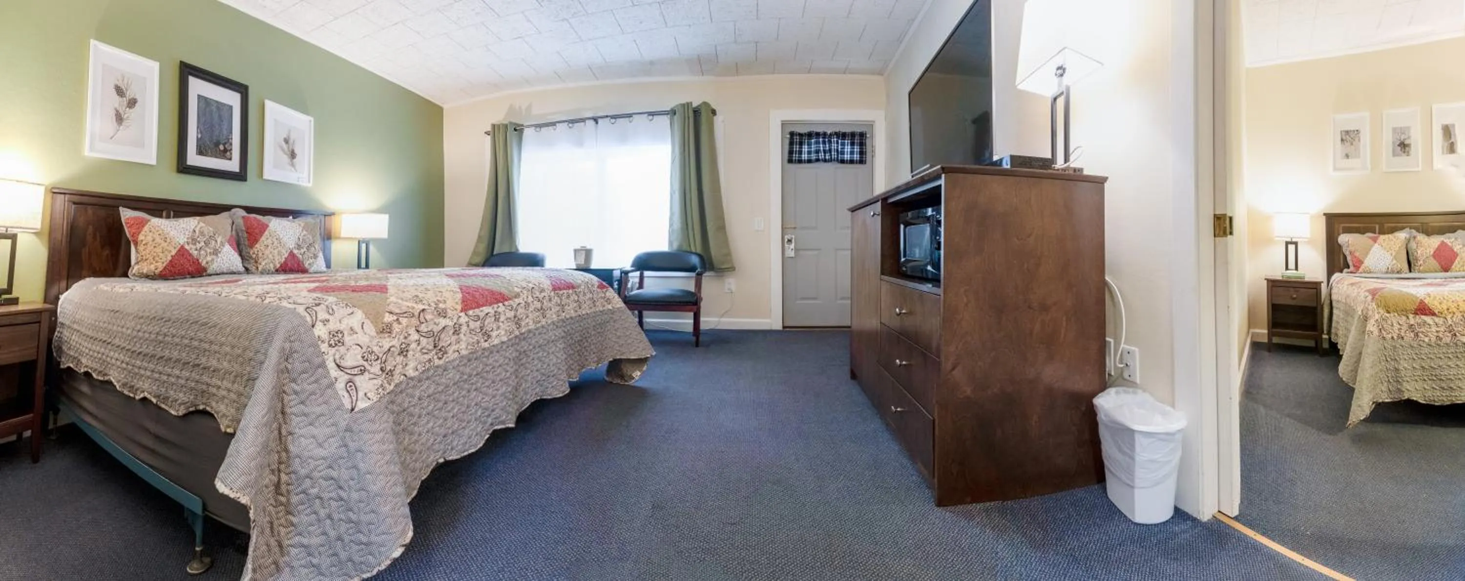 Bed in Acadia Pines Motel