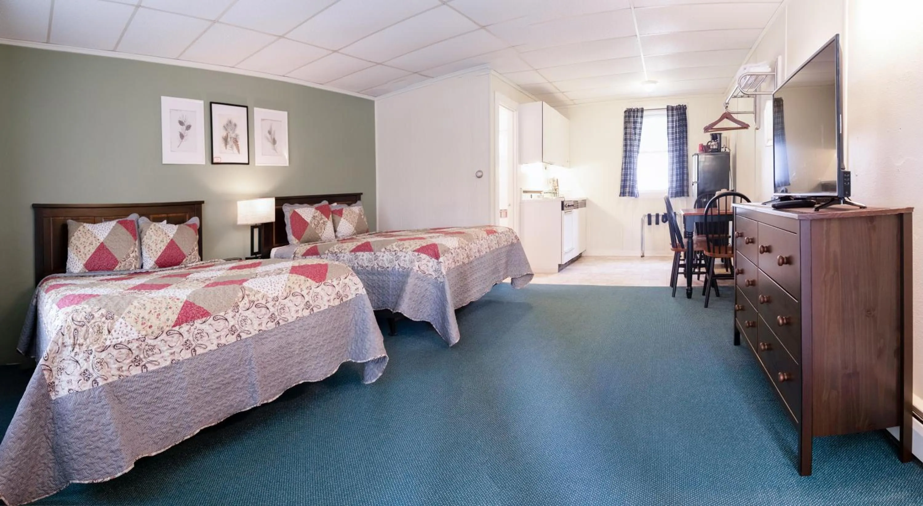 Bed in Acadia Pines Motel