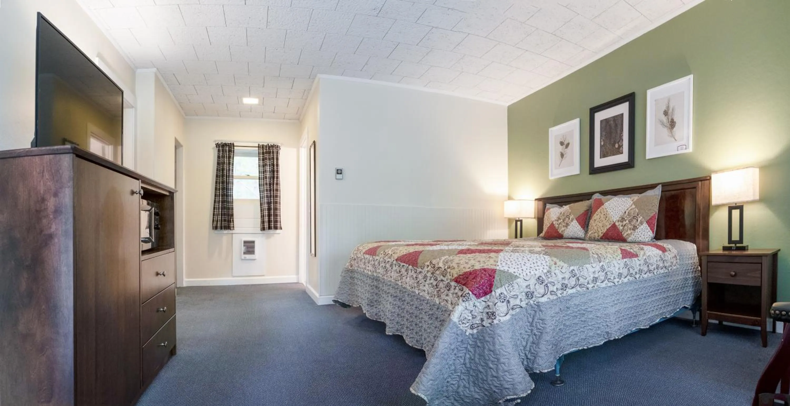 Bed in Acadia Pines Motel