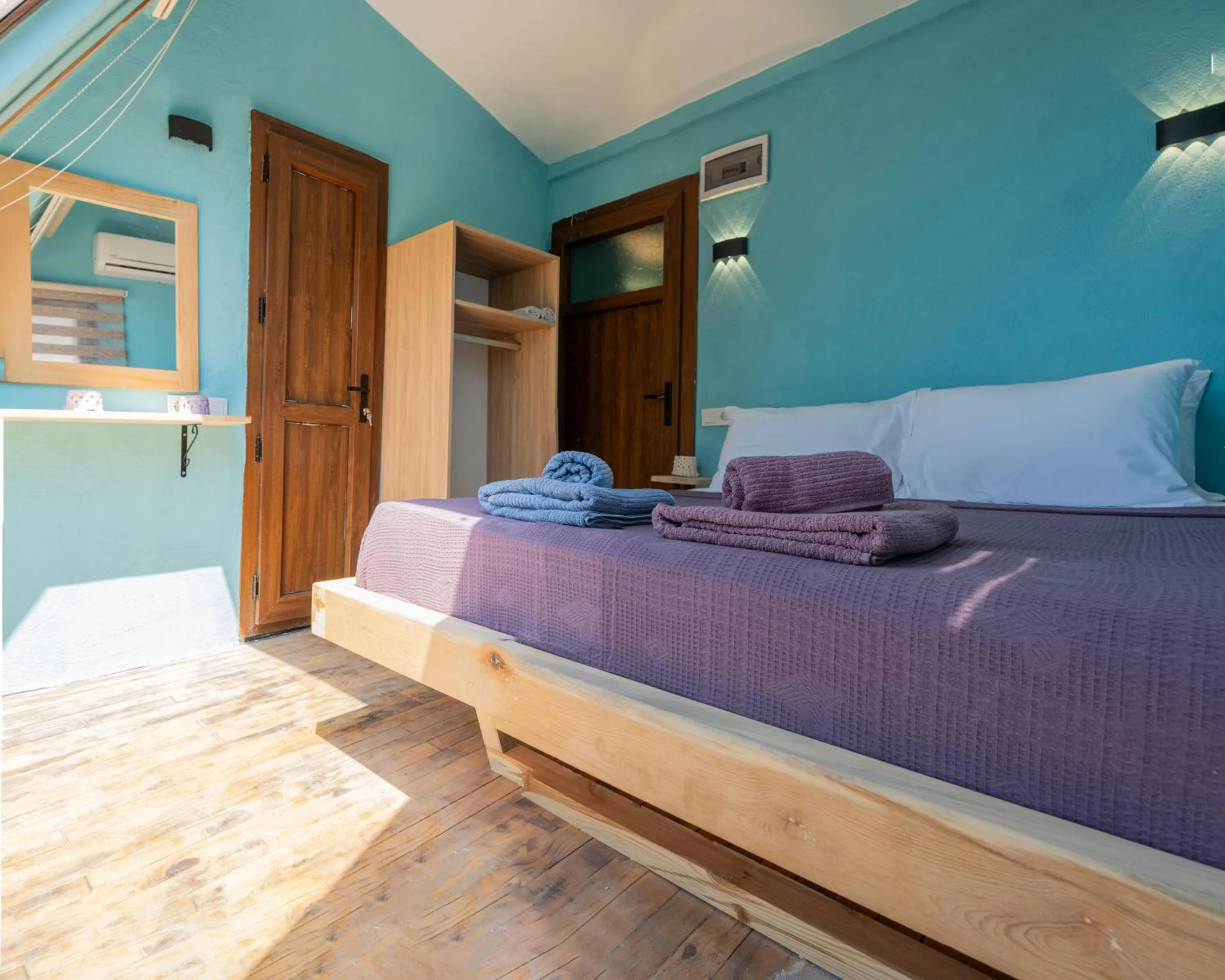 Bed in Goat Bungalow and Camping