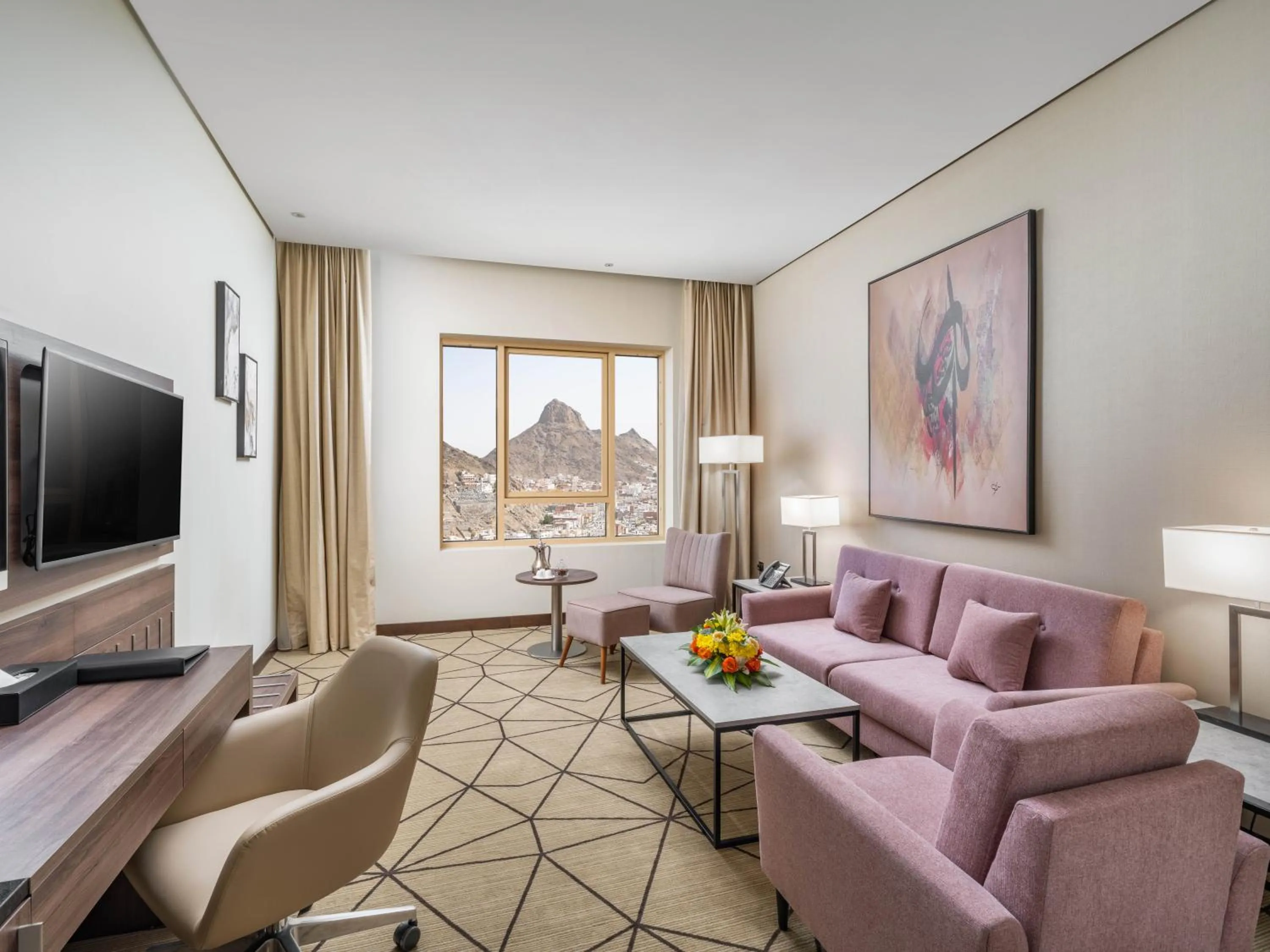 Living room in Wirgan Al Noor, Tapestry Collection by Hilton