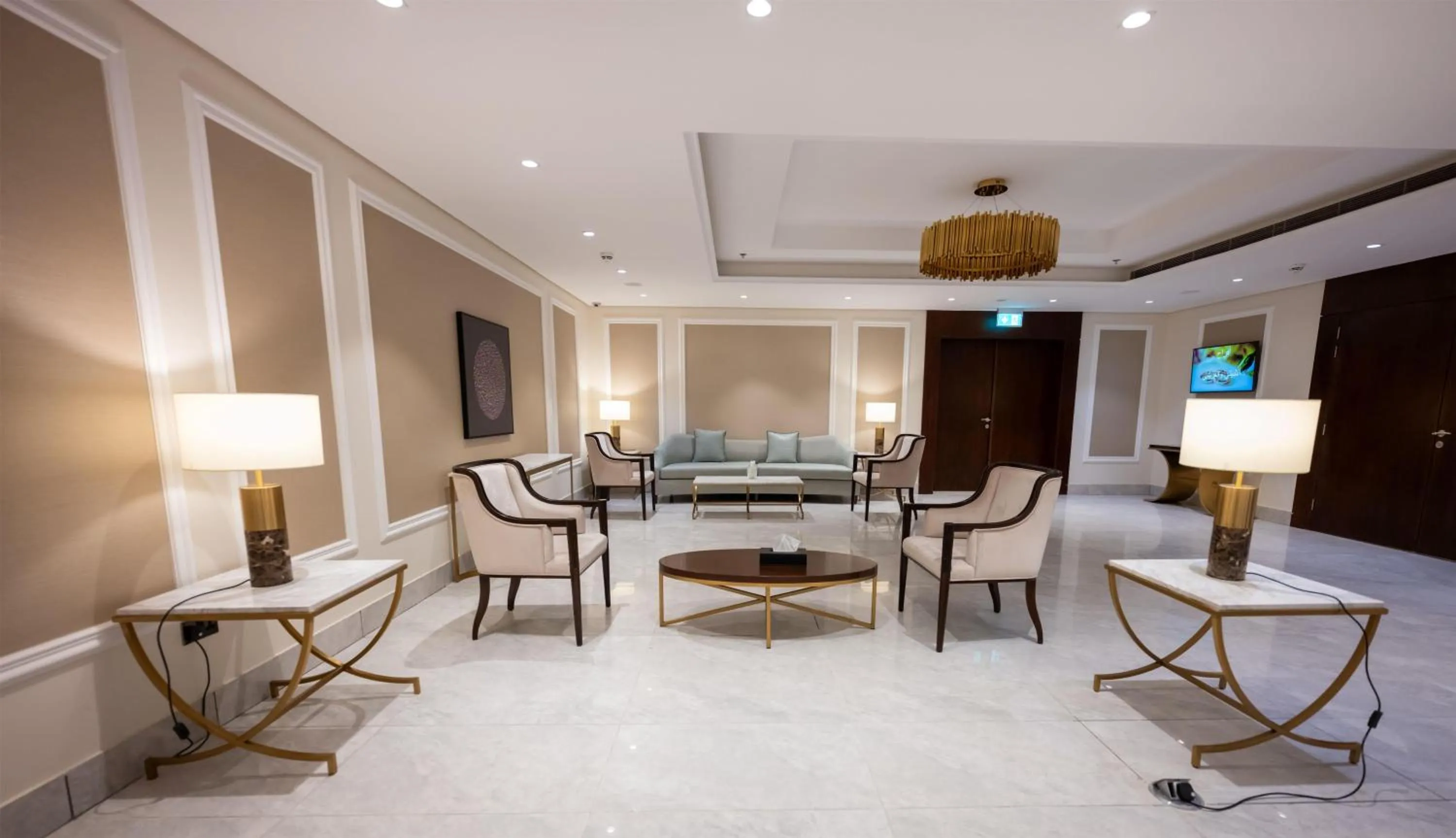 Living room in Wirgan Al Noor, Tapestry Collection by Hilton