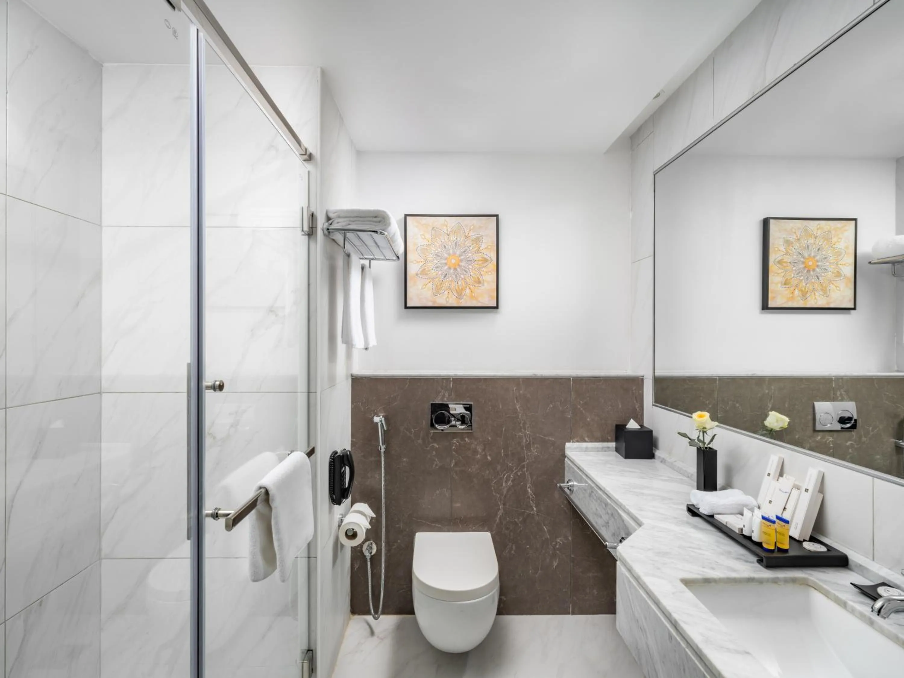 Toilet in Wirgan Al Noor, Tapestry Collection by Hilton