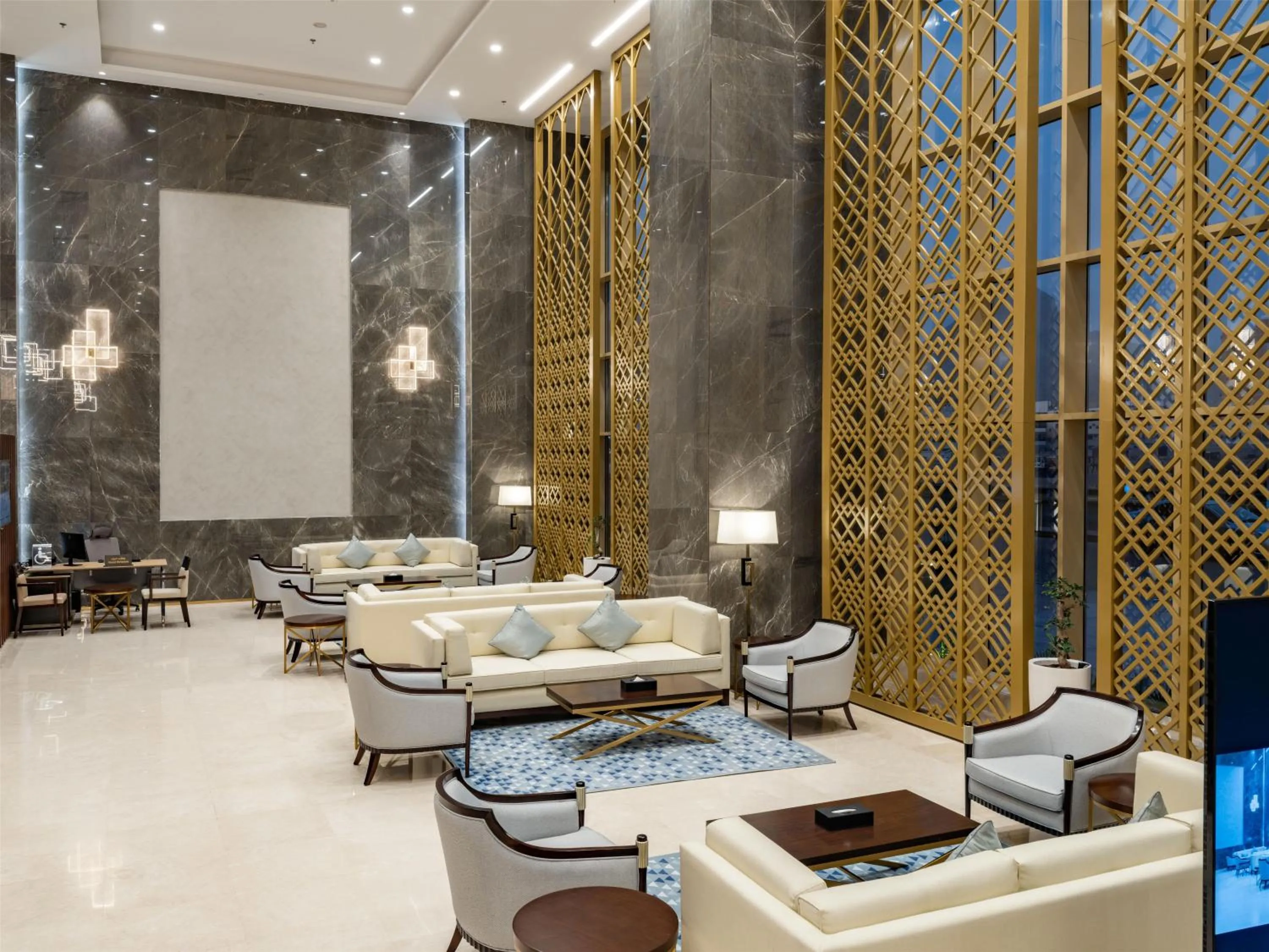 Communal lounge/ TV room in Wirgan Al Noor, Tapestry Collection by Hilton