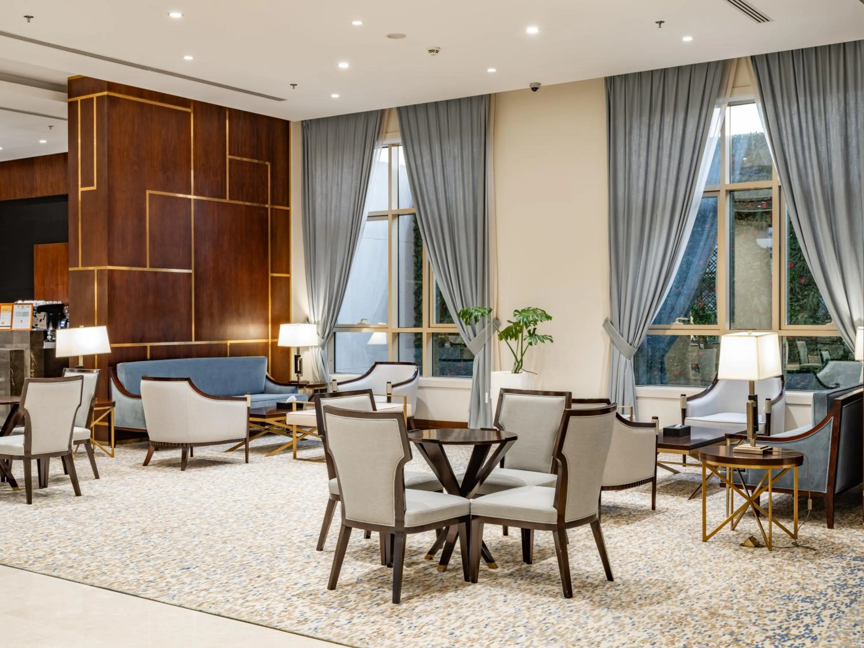 Communal lounge/ TV room in Wirgan Al Noor, Tapestry Collection by Hilton