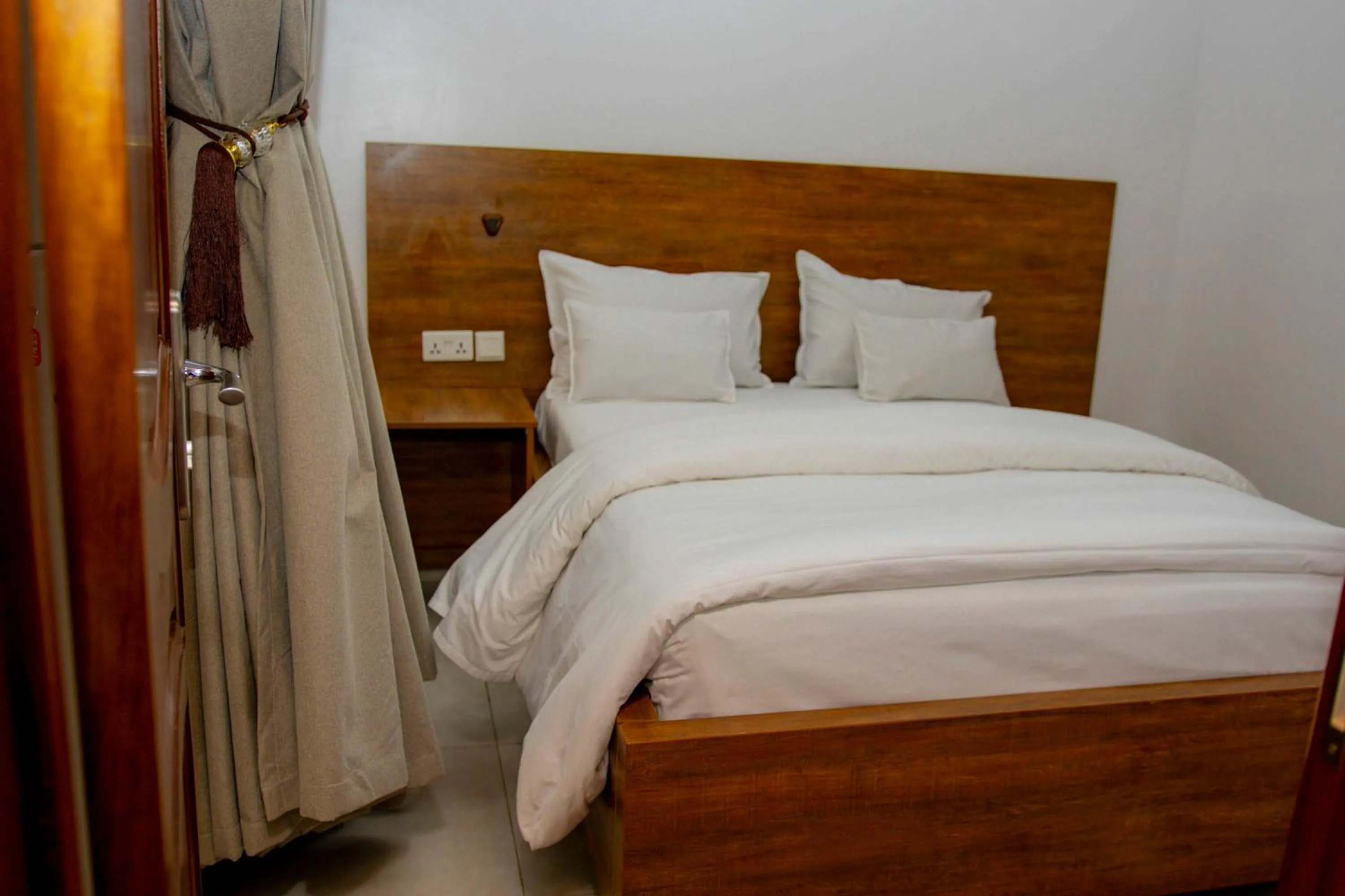 Bed in ALLY NGALI MOTEL