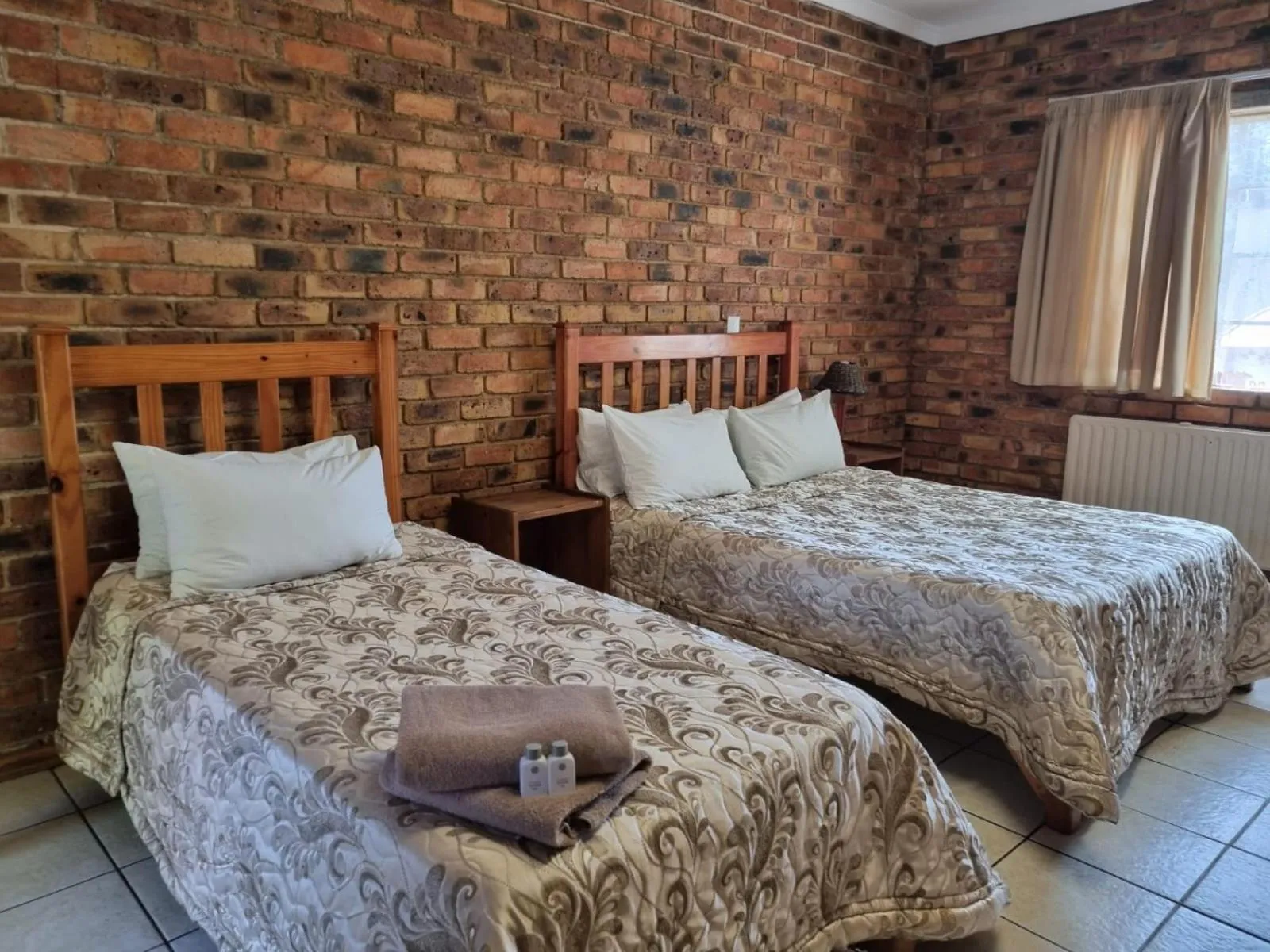 Bed in Emerald Guesthouse